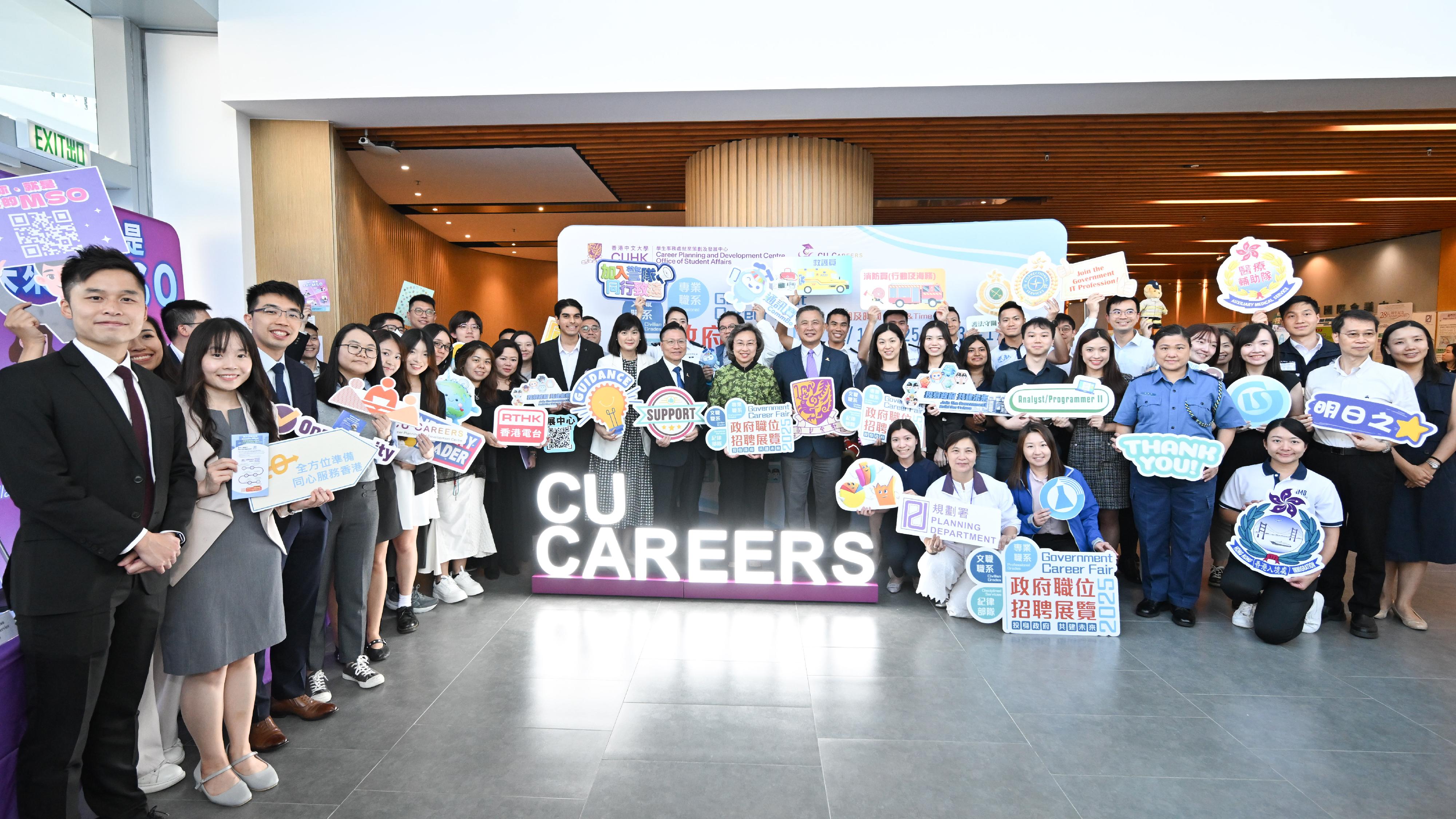The Secretary for the Civil Service, Mrs Ingrid Yeung, visited the Government Career Fair at the campus of the Chinese University of Hong Kong (CUHK) this afternoon (October 2). Mrs Yeung (front row, 13th left) and the Pro-Vice-Chancellor/Vice-President (Education) of the CUHK, Professor Irwin King (front row, 14th left), are pictured with representatives of participating government bureaux and departments and students at the fair.