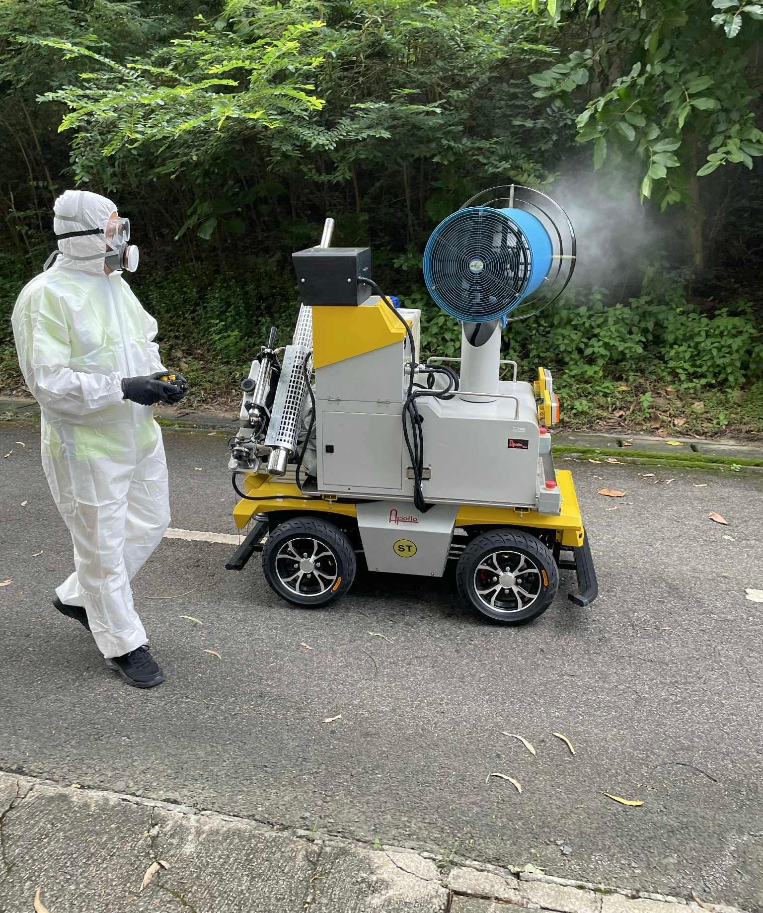 The Food and Environmental Hygiene Department (FEHD) conducted mosquito prevention and control work in Sha Tin. Photo shows a staff member of the FEHD's contractor using a large robotics ultra-low volume fogger to carry out fogging operations aimed at eradicating adult mosquitoes in Ma On Shan.