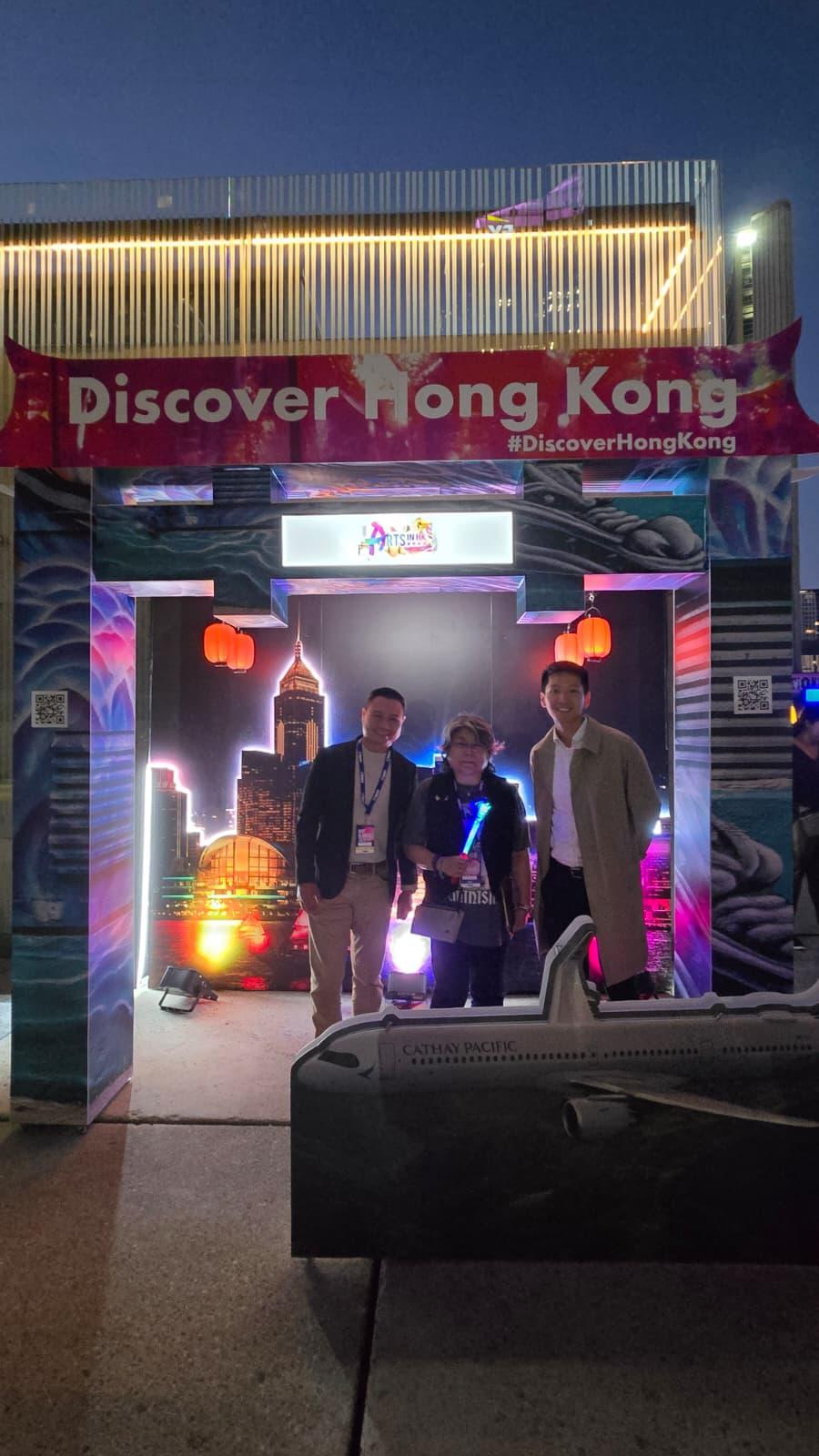 Hong Kong media artist, Ellen Pau (centre), is pictured with the Acting Director of Hong Kong Economic and Trade Office (Toronto), Mr Gavin Yeung (right), and the Senior Marketing Manager of Hong Kong Tourism Board, Mr Jorge Lee, at Nuit Blanche Toronto 2025 on October 4 (Toronto time).