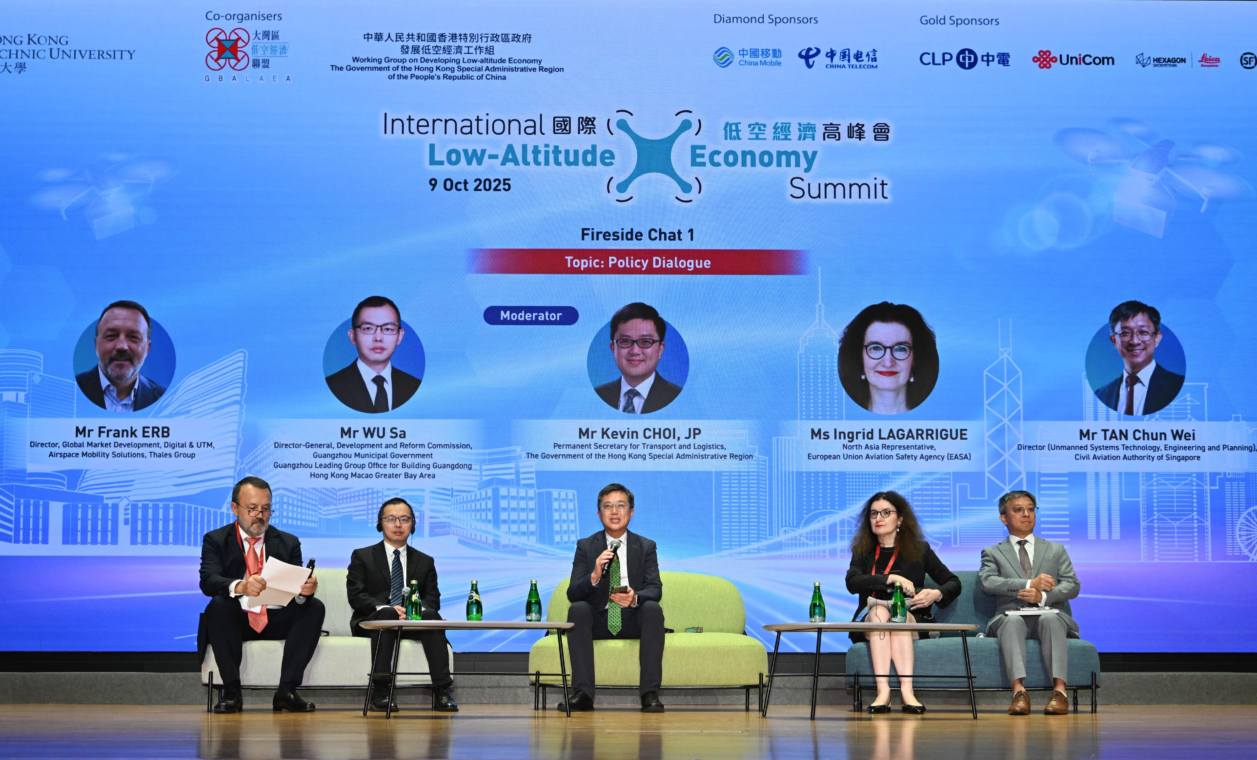 The International Low-Altitude Economy Summit was held today (October 9). Photo shows the Permanent Secretary for Transport and Logistics, Mr Kevin Choi (centre), moderating a fireside chat on Policy Dialogue on the low-altitude economy. Mr Choi exchanged views with the Party Secretary and Director-General of the Development and Reform Commission, Guangzhou Municipal Government, Mr Wu Sa (second left); the Director of Global Market Development, Digital & UTM, Airspace Mobility Solutions of the Thales Group, Mr Frank Erb (first left); the North Asia Representative of the European Union Aviation Safety Agency, Ms Ingrid Lagarrigue (second right); and the Director (Unmanned Systems Technology, Engineering and Planning) of the Civil Aviation Authority of Singapore, Mr Tan Chun-wei (first right).

