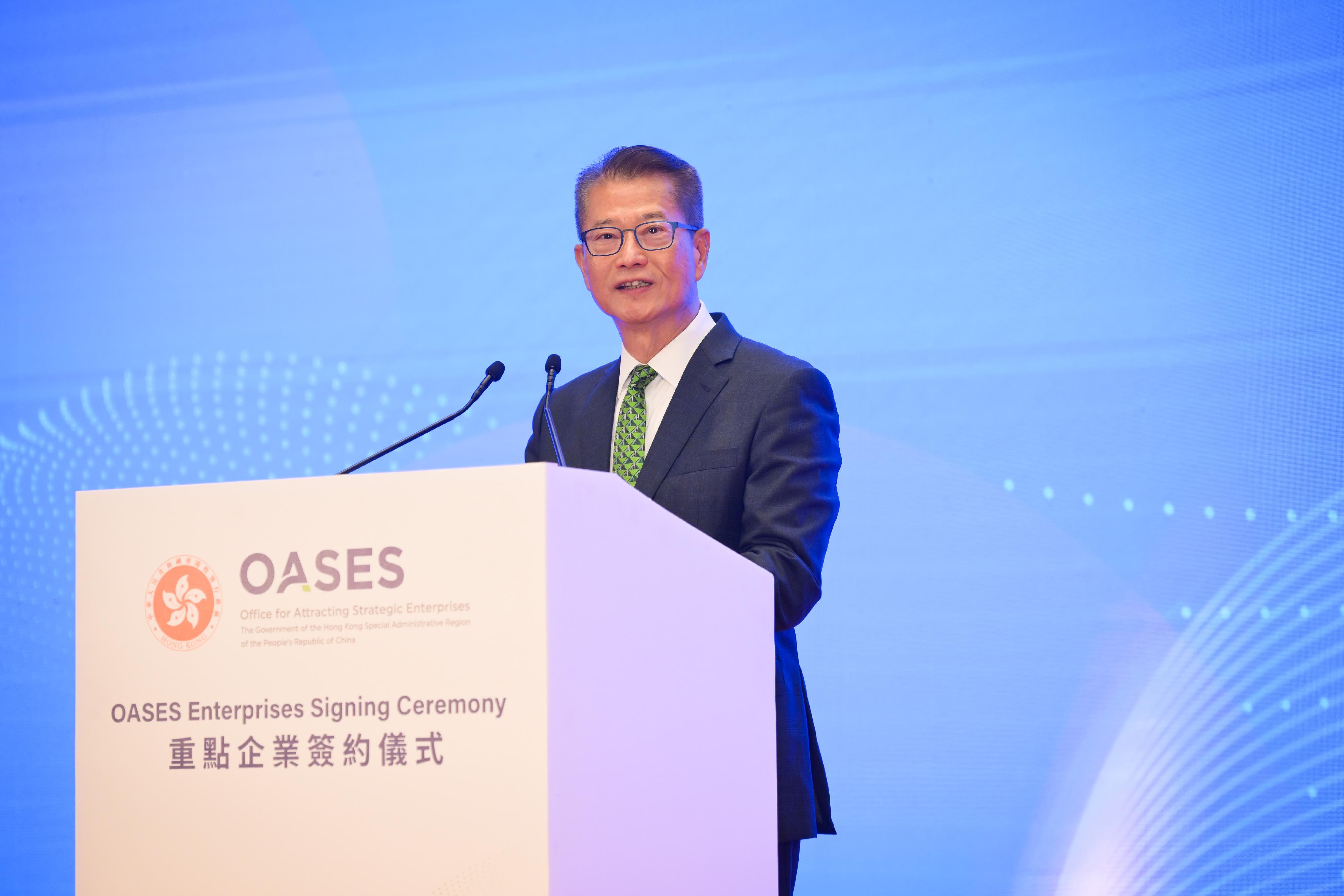 The Financial Secretary, Mr Paul Chan, speaks at the OASES Enterprises Signing Ceremony today (October 9).