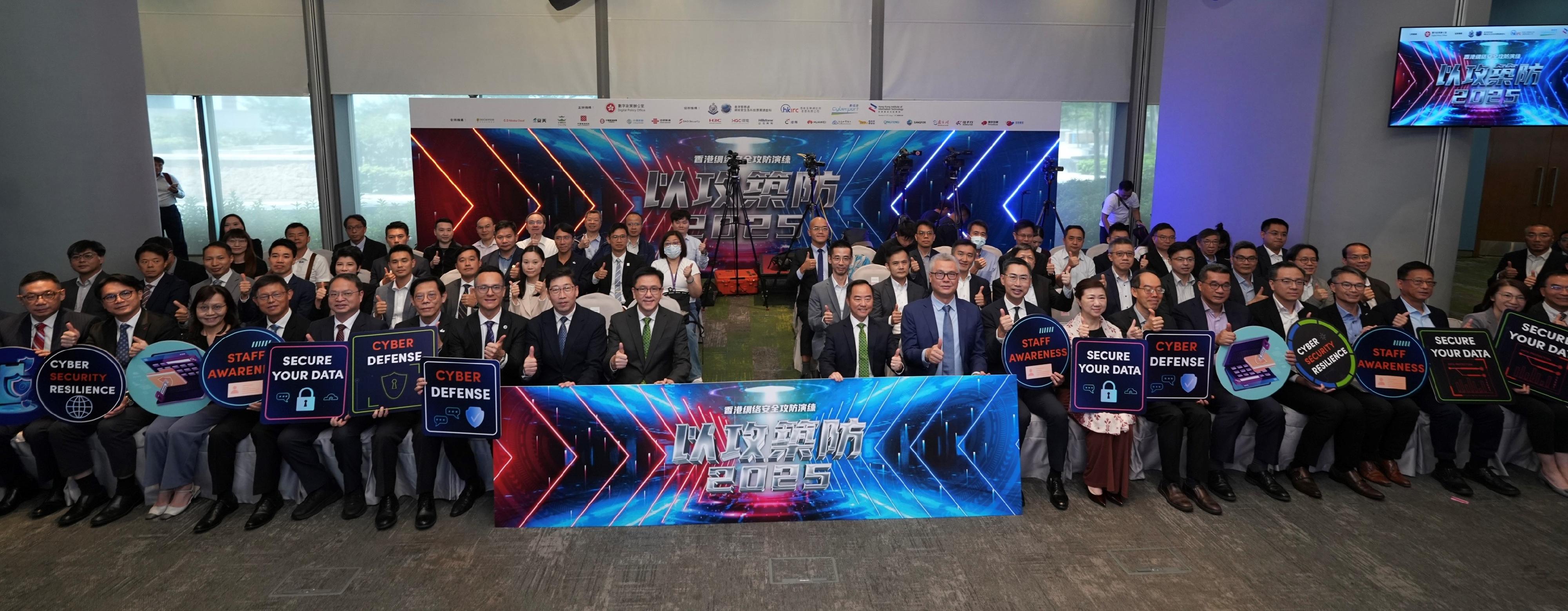 The Secretary for Innovation, Technology and Industry, Professor Sun Dong, officiated at the opening ceremony of the Hong Kong Cybersecurity Attack and Defence Drill 2025 today (October 10). Photo shows (first row, from fifth left) the Principal of the Hong Kong Institute of Information Technology, Dr John Hui; the Executive Director of the Vocational Training Council, Mr Donald Tong; the Chief Superintendent of the Cyber Security and Technology Crime Bureau of the Hong Kong Police Force, Mr Lam Cheuk-ho; the Deputy Commissioner (Digital Infrastructure), Mr Daniel Cheung; Professor Sun; the Commissioner for Digital Policy, Mr Tony Wong; the Chief Executive Officer of the Hong Kong Cybersecurity Professional Association, Dr Rocky Cheng; the Chief Executive Officer of the Hong Kong Internet Registration Corporation, Mr Wilson Wong, and other guests.