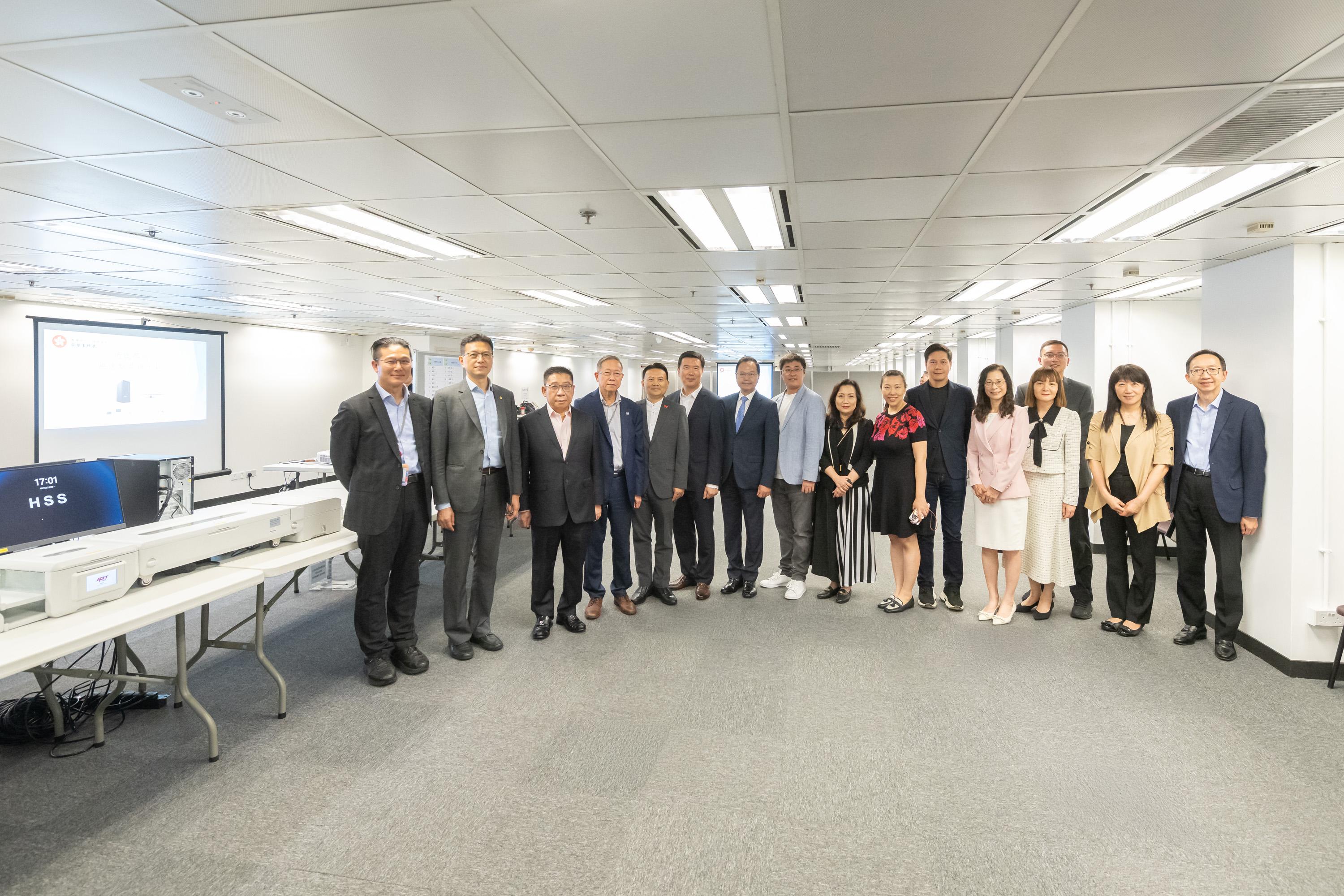 The Legislative Council (LegCo) Panel on Constitutional Affairs visited the Registration and Electoral Office (REO) today (October 13) to observe a demonstration of the electronic counting system (ECS) for the functional constituency election of the LegCo General Election. The Chairman of the Panel on Constitutional Affairs, Mr Lai Tung-kwok (fourth left), the Deputy Chairman, Mr Chan Yung (fifth left), and other LegCo Members posed for a group photo with representatives of the Constitutional and Mainland Affairs Bureau and the REO.
