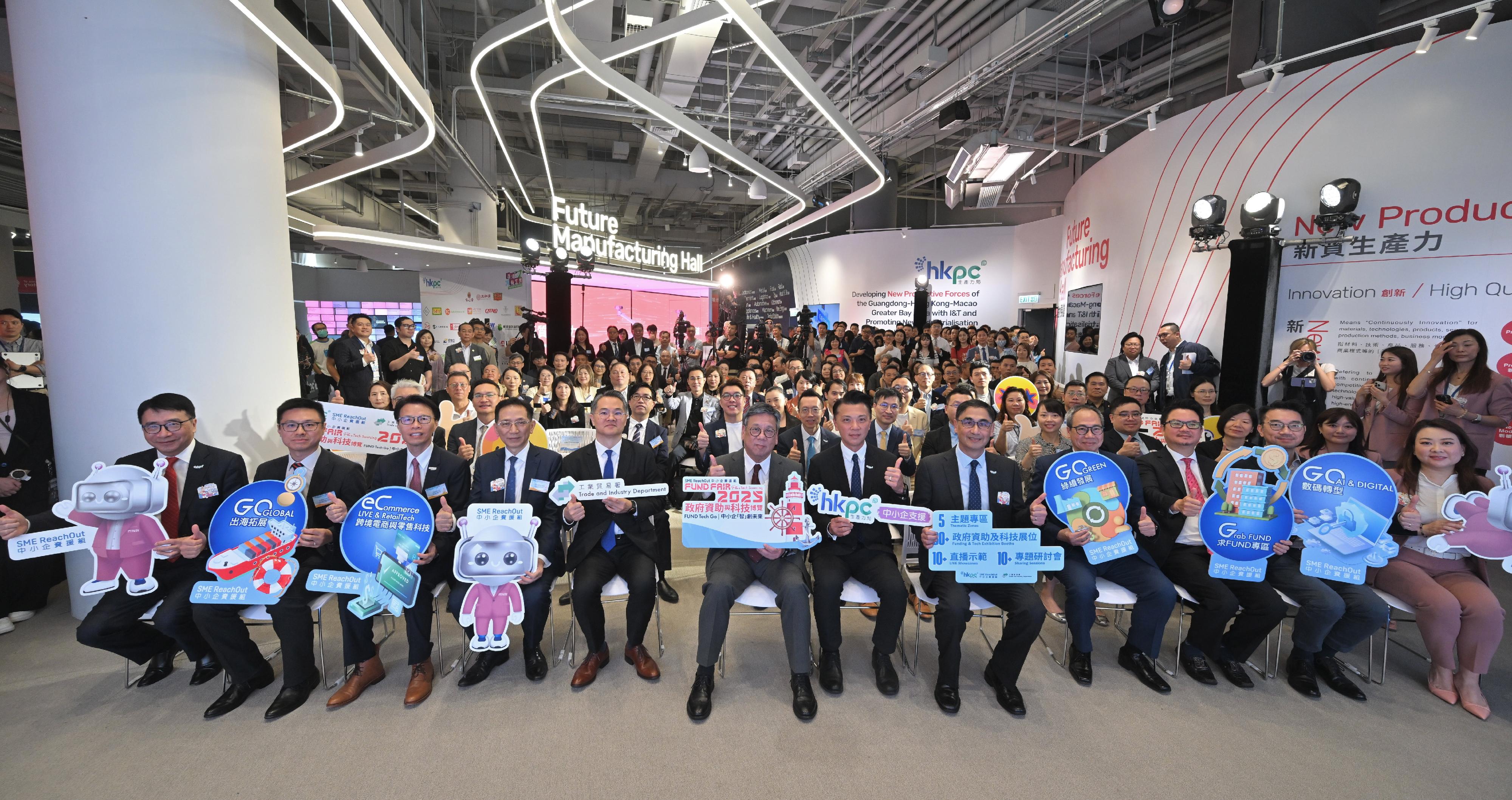 With support from the Trade and Industry Department, the Hong Kong Productivity Council (HKPC) is holding "SME ReachOut: FUND Fair plus Tech Sourcing 2025" (the Fair) for two consecutive days starting today (October 16). Photo shows the Secretary for Commerce and Economic Development, Mr Algernon Yau (first row, seventh right); the Director-General of Trade and Industry, Mr Aaron Liu (first row, fifth left); the Chairman of the HKPC, Mr Sunny Tan (first row, sixth right); the Executive Director of the HKPC, Mr Mohamed Butt (first row, fifth right), and other guests at the Fair.
