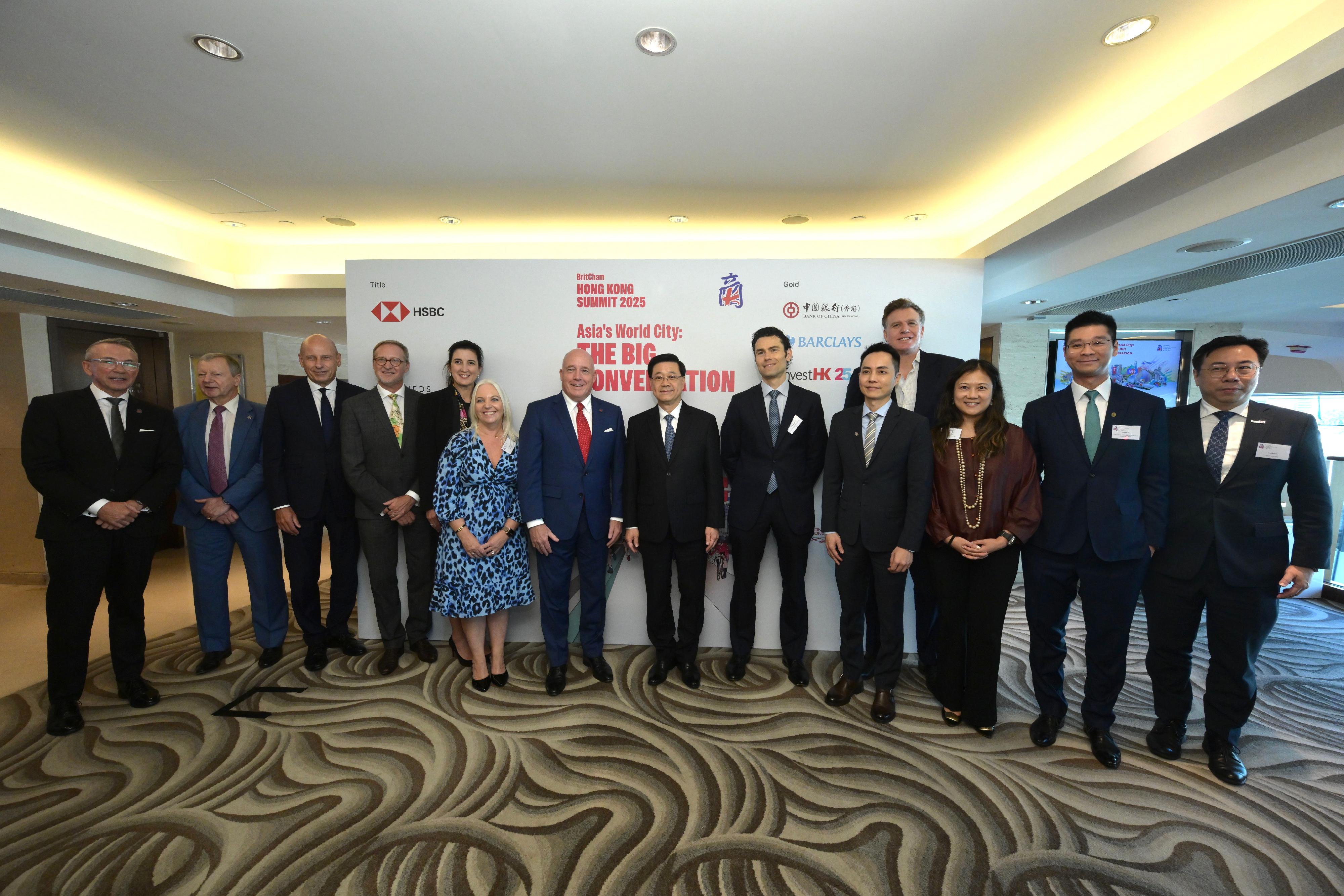 The Chief Executive, Mr John Lee, attended the BritCham Hong Kong Summit 2025 today (October 16). Photo shows Mr Lee (seventh right); the British Consul General to Hong Kong and Macao, Mr Brian Davidson (fourth left); the Chair of the British Chamber of Commerce in Hong Kong, Mr Jeremy Sheldon (seventh left); the Executive Director of the British Chamber of Commerce in Hong Kong, Mr Paul McComb (first left); and other guests at the event.