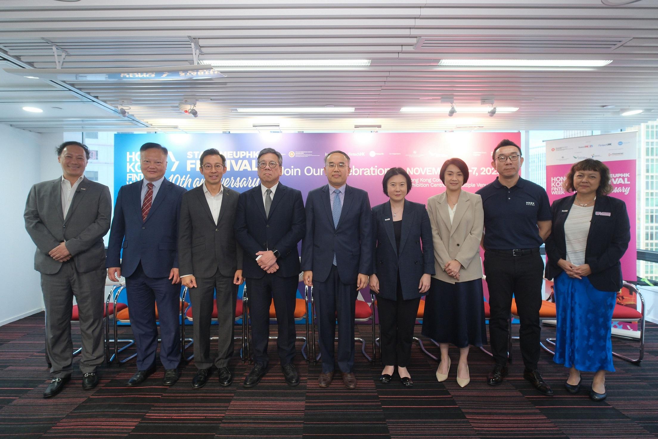 Invest Hong Kong (InvestHK) today (October 17) announced details of the Hong Kong FinTech Week x StartmeupHK Festival 2025. Photo shows (from left) the Global Head of Financial Services, Fintech & Sustainability of InvestHK, Mr King Leung; the Associate Director, Policy and Legislation of the Insurance Authority, Mr Tony Chan; the Chief Fintech Officer of the Hong Kong Monetary Authority, Mr George Chou; the Secretary for Commerce and Economic Development, Mr Algernon Yau; the Secretary for Financial Services and the Treasury, Mr Christopher Hui; the Director-General of Investment Promotion of InvestHK, Ms Alpha Lau; the Director of Intermediaries and Head of Fintech Unit of the Securities and Futures Commission, Ms Elizabeth Wong; the Group Chief Technology Officer of Hong Kong Exchanges and Clearing Limited, Mr John Hsu; and the Head of Startups of InvestHK, Ms Jayne Chan, at today's press conference.