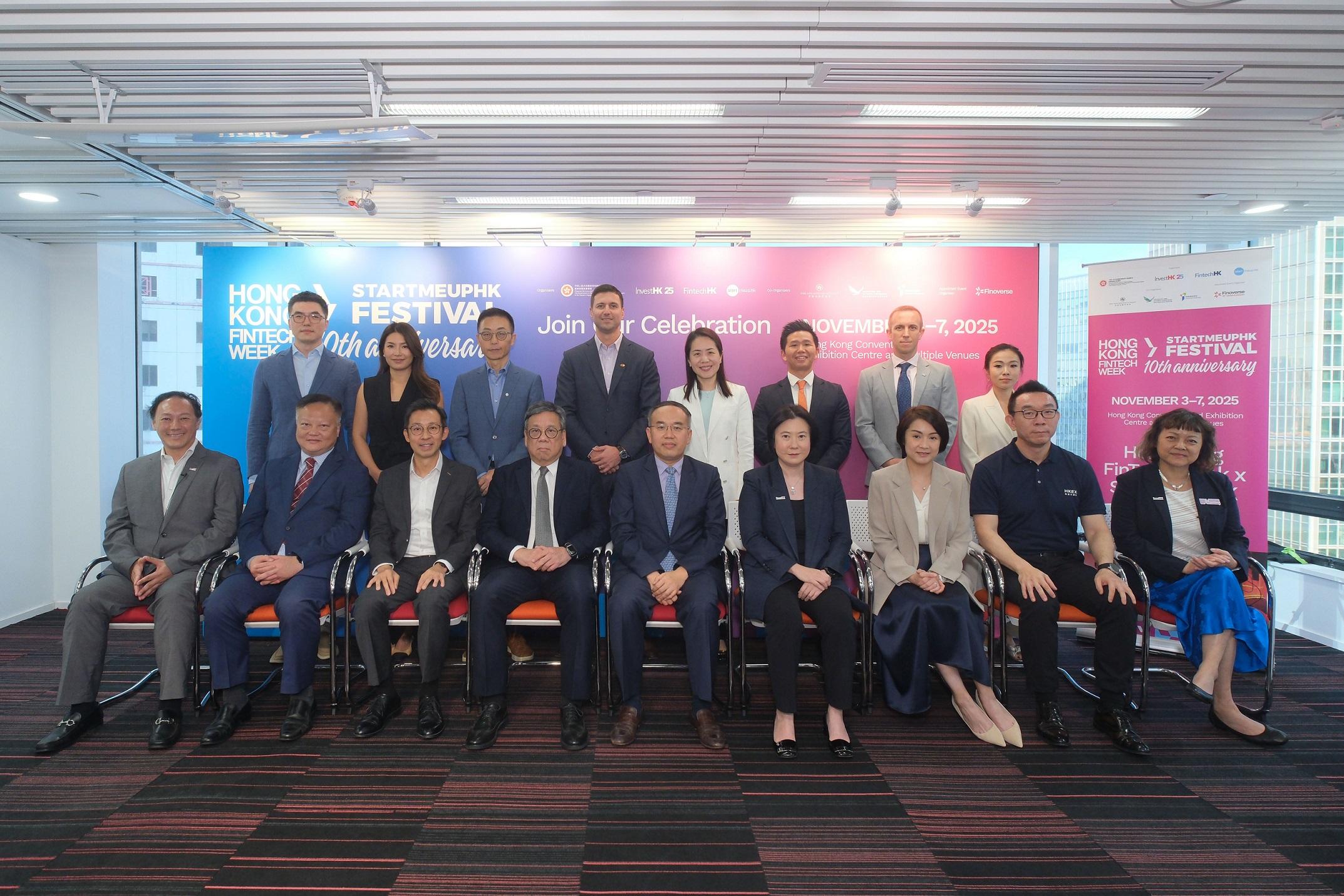 Invest Hong Kong (InvestHK) today (October 17) announced details of the Hong Kong FinTech Week x StartmeupHK Festival 2025. Photo shows (front row, from left) the Global Head of Financial Services, Fintech & Sustainability of InvestHK, Mr King Leung; the Associate Director, Policy and Legislation of the Insurance Authority, Mr Tony Chan; the Chief Fintech Officer of the Hong Kong Monetary Authority, Mr George Chou; the Secretary for Commerce and Economic Development, Mr Algernon Yau; the Secretary for Financial Services and the Treasury, Mr Christopher Hui; the Director-General of Investment Promotion of InvestHK, Ms Alpha Lau; the Director of Intermediaries and Head of Fintech Unit of the Securities and Futures Commission, Ms Elizabeth Wong; the Group Chief Technology Officer of Hong Kong Exchanges and Clearing Limited, Mr John Hsu; and the Head of Startups of InvestHK, Ms Jayne Chan. Also present are (back row, from left) the General Manager of Strategic Development and Solutioning at Ant Digital Technologies, Mr Boz Wang; the Head of Product and Strategy of ChinaAMC (HK), Ms Katie He; the Chief Digital Officer, Personal Banking and Wealth Management of Bank of China (Hong Kong), Mr Daniel Li; the Group Head of Innovation and Digital Partnerships of HSBC, Mr Bojan Obradović; the Chief Operating Officer and Head of CEO Office of Standard Chartered Hong Kong, Ms Rose Kay; the Managing Director, Head of Hong Kong and Southeast Asia Intermediary Business of Invesco, Mr Ken Lin; the CAO of Citi Hong Kong, Mr Chris Long; and the Co-Founder of Finoverse, Ms Vila Wong.