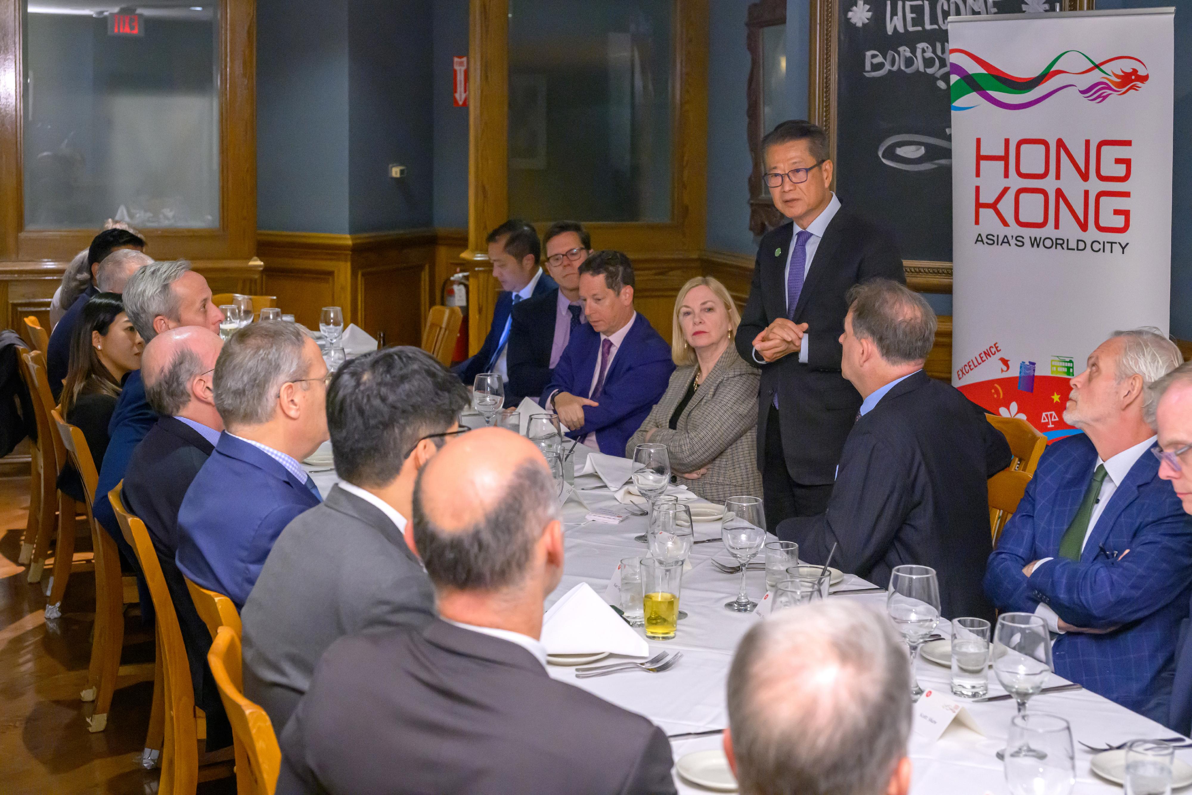 The Financial Secretary, Mr Paul Chan, arrived in Washington DC on October 16 (Washington time) after concluding his visit to New York. Photo shows Mr Chan (fourth right) attending a dinner hosted by the Hong Kong Economic and Trade Office in Washington DC, and engaging with members of the local business and think tank community.