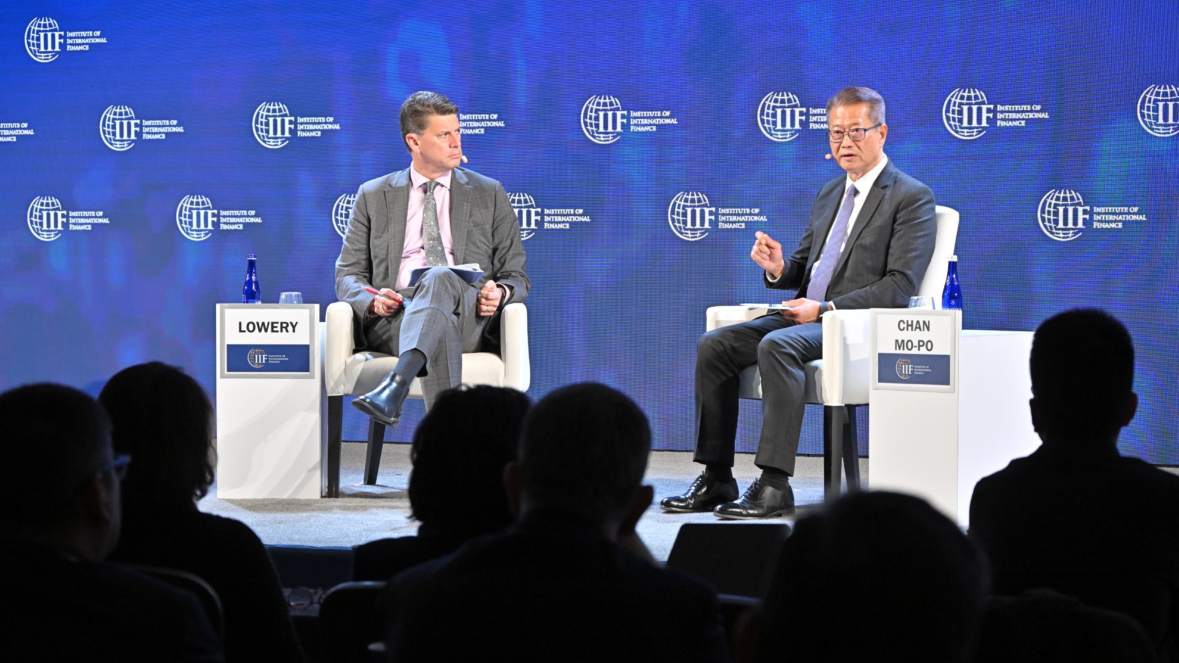 The Financial Secretary, Mr Paul Chan, continued his visit in Washington, DC, the US yesterday (October 17, Washington time) to attend the Annual Meetings of the International Monetary Fund (IMF) and World Bank Group. Photo shows Mr Chan participating in an in-conversation session organised by the Institute of International Finance.