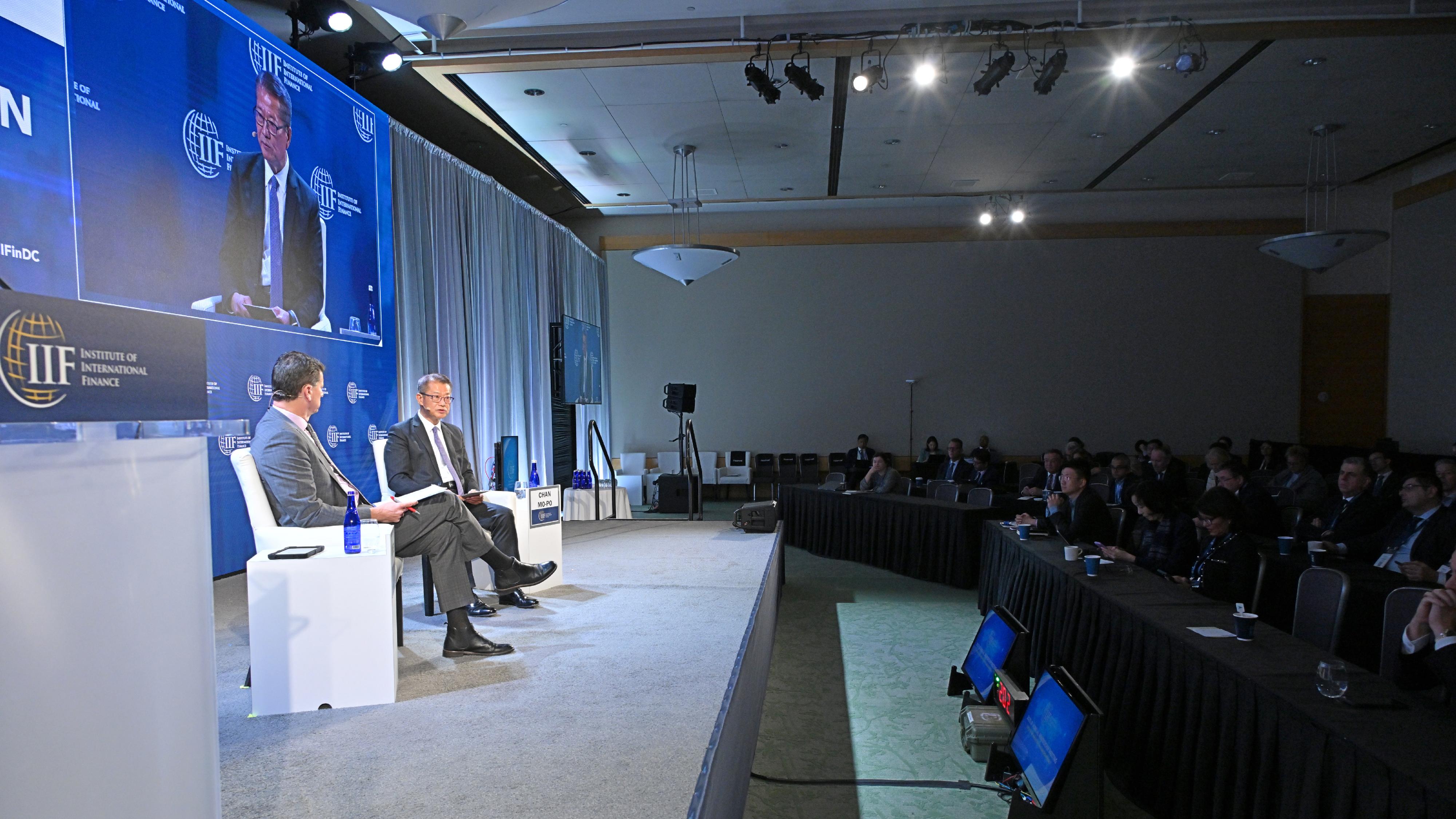 The Financial Secretary, Mr Paul Chan, continued his visit in Washington, DC, the US yesterday (October 17, Washington time) to attend the Annual Meetings of the International Monetary Fund (IMF) and World Bank Group. Photo shows Mr Chan participating in an in-conversation session organised by the Institute of International Finance.