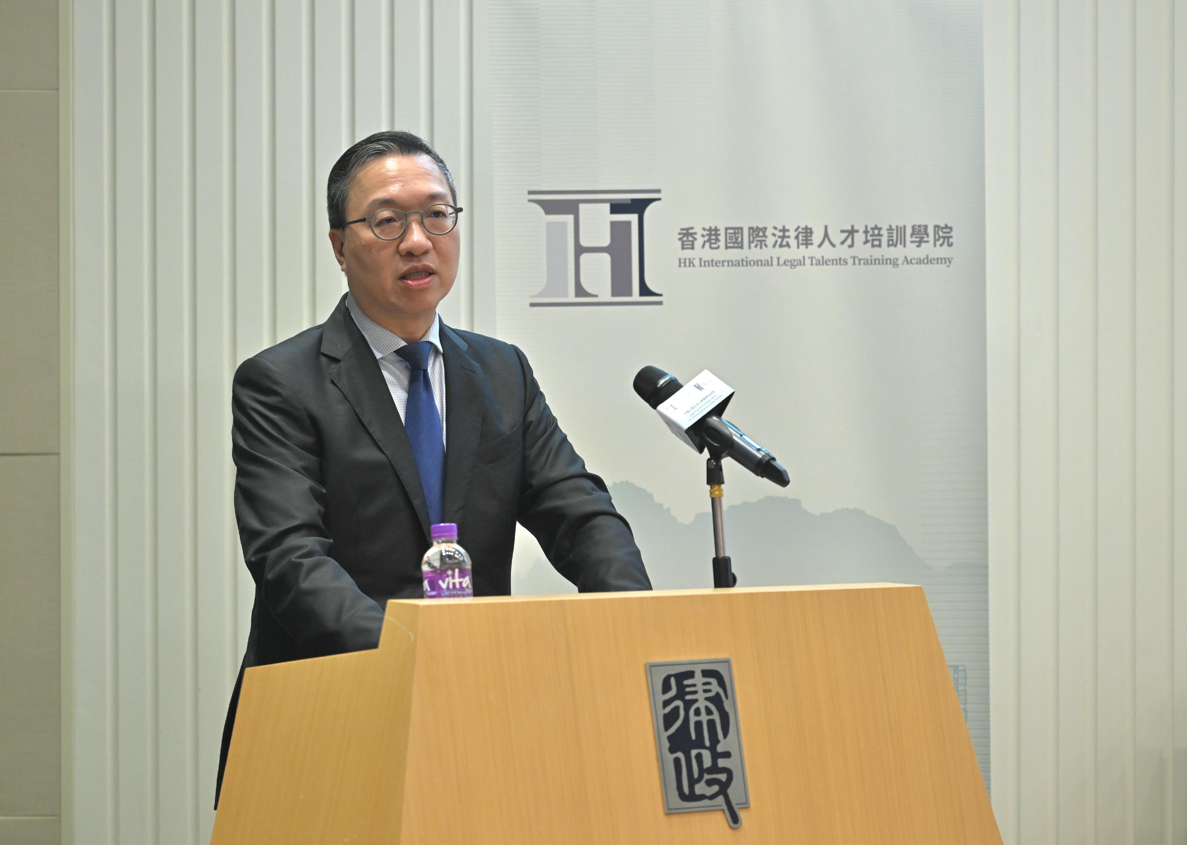The Secretary for Justice, Mr Paul Lam, SC, speaks at the opening ceremony of the Legal Practical Training Course for Chinese Enterprises Going Overseas today (October 20).