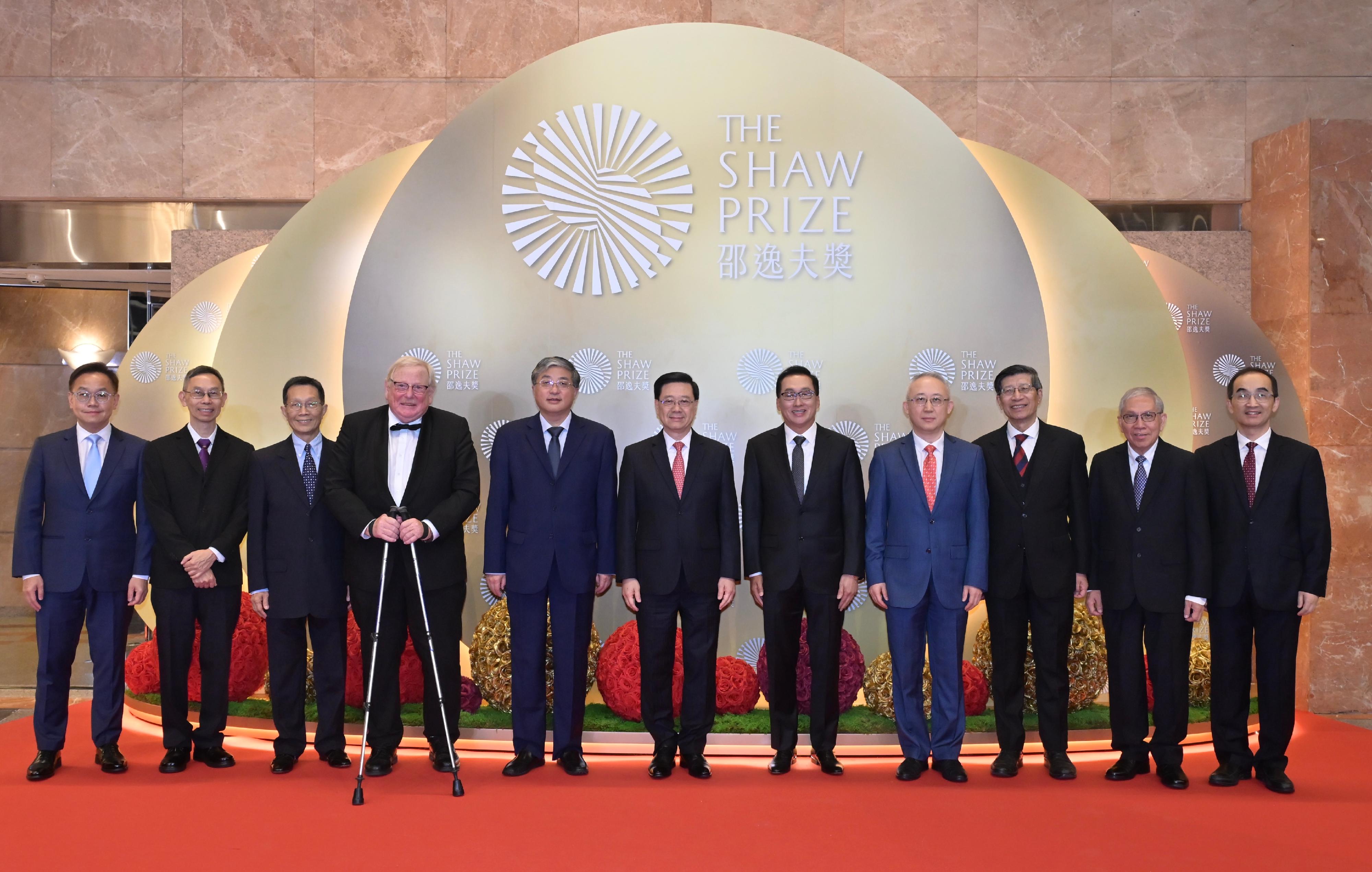 The Chief Executive, Mr John Lee, attended the Shaw Prize Award Presentation Ceremony 2025 this evening (October 21). Photo shows (from fourth left) the Chair of the Board of Adjudicators of the Shaw Prize Foundation, Professor Reinhard Genzel; Deputy Director of the Liaison Office of the Central People's Government in the Hong Kong Special Administrative Region Mr Luo Yonggang; Mr Lee; the Chair of the Shaw Prize Foundation, Dr Raymond Chan; Acting Commissioner of the Office of the Commissioner of the Ministry of Foreign Affairs in the Hong Kong Special Administrative Region, Mr Li Yongsheng; the Chair of the Shaw Prize Council, Professor Kenneth Young, and other guests at the ceremony.