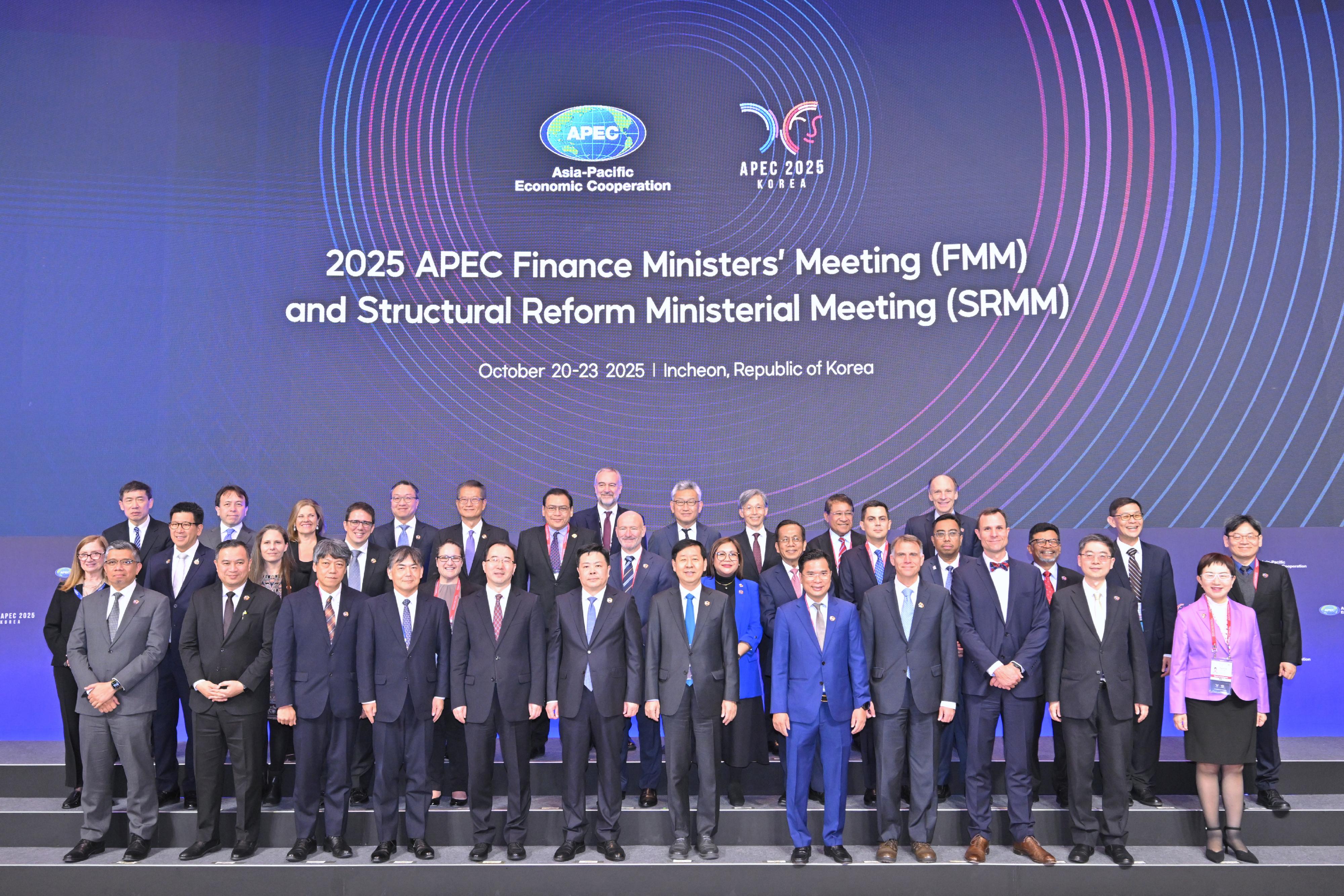 The Financial Secretary, Mr Paul Chan, and the Secretary for Justice, Mr Paul Lam, SC, attended the joint session of the Asia-Pacific Economic Cooperation Finance Ministers' Meeting and Structural Reform Ministerial Meeting in Incheon, Korea, today (October 22). Photo shows Mr Chan (back row, fifth left) and Mr Lam (back row, fourth left) in a group photo.