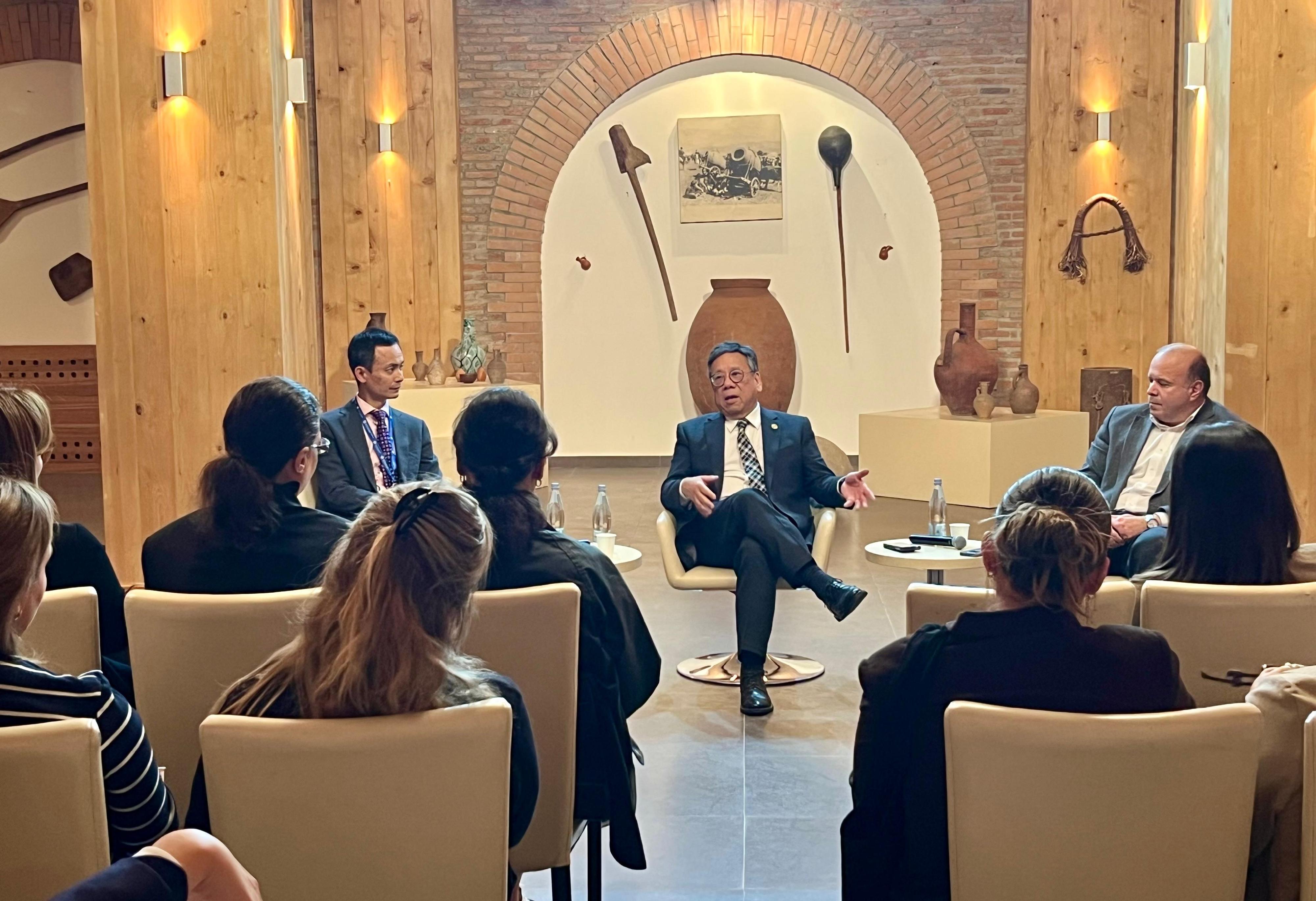 The Secretary for Commerce and Economic Development, Mr Algernon Yau (centre), holds a business roundtable in Tbilisi, Georgia, on October 22 (Tbilisi time) with local wine practitioners to brief them on Hong Kong's advantages as a wine and liquor trading hub, and exchange views on exploring further collaboration between the two places on wine and liquor promotion.