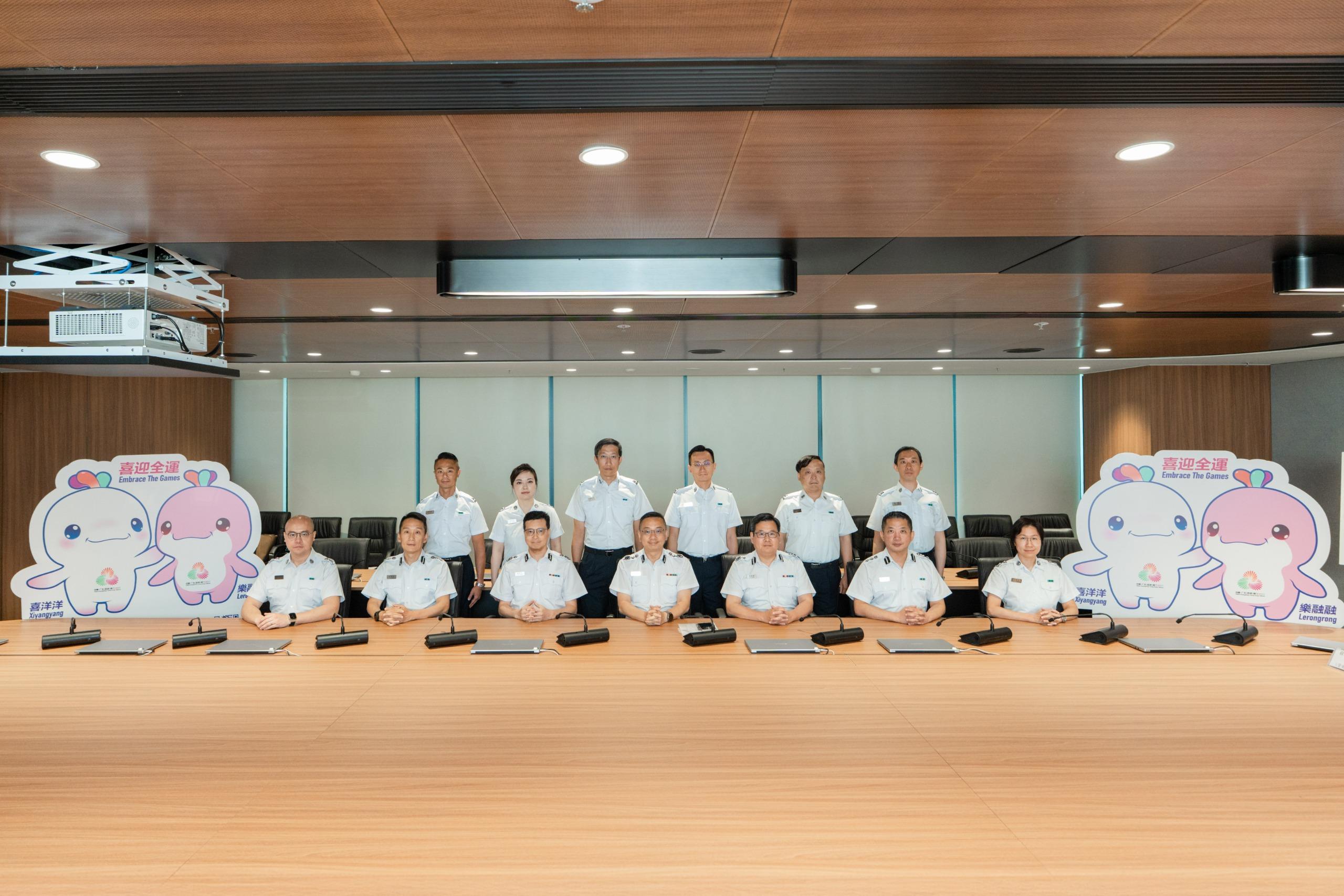 The Immigration Department conducted a tabletop exercise yesterday (October 21) to rehearse the handling of emergency incidents during the 15th National Games. Photo shows the Director of Immigration, Mr Benson Kwok (first row, centre); the Deputy Director (Control, Visa and Documents), Mr Ching Wo-mok (first row, third left); and the Assistant Director (Control), Mr Fan Hiu-sing (first row, third right), with commanders of each control point.