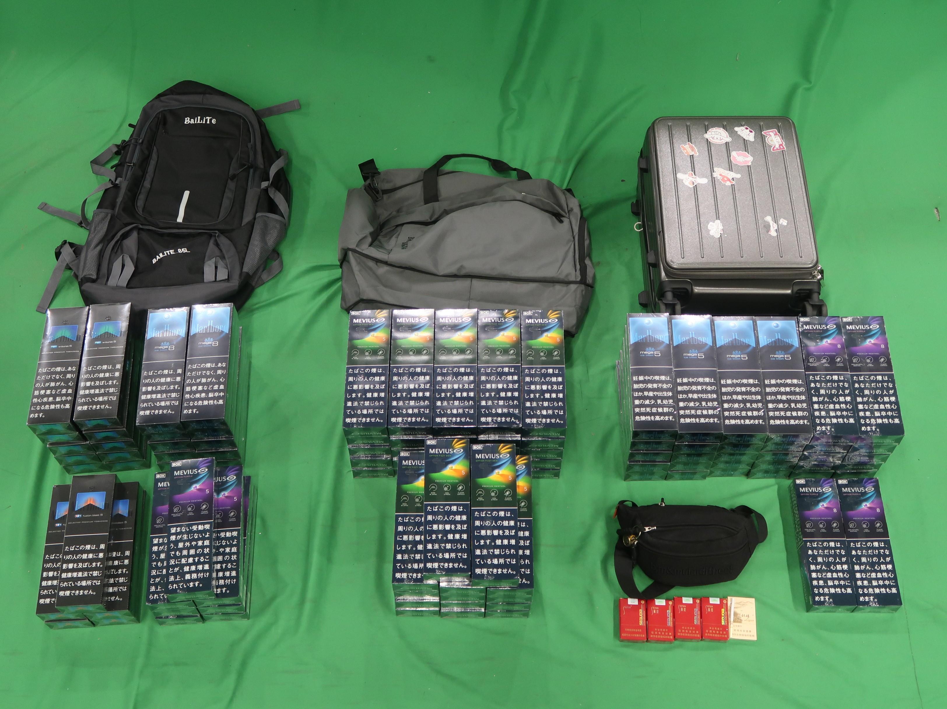An incoming male passenger was sentenced to four months’ imprisonment and fined $2,000 at the West Kowloon Magistrates' Courts today (October 23) for dealing with duty-not-paid cigarettes and failing to declare them to Customs officers, in contravention of the Dutiable Commodities Ordinance. Photo shows the duty-not-paid cigarettes seized.

