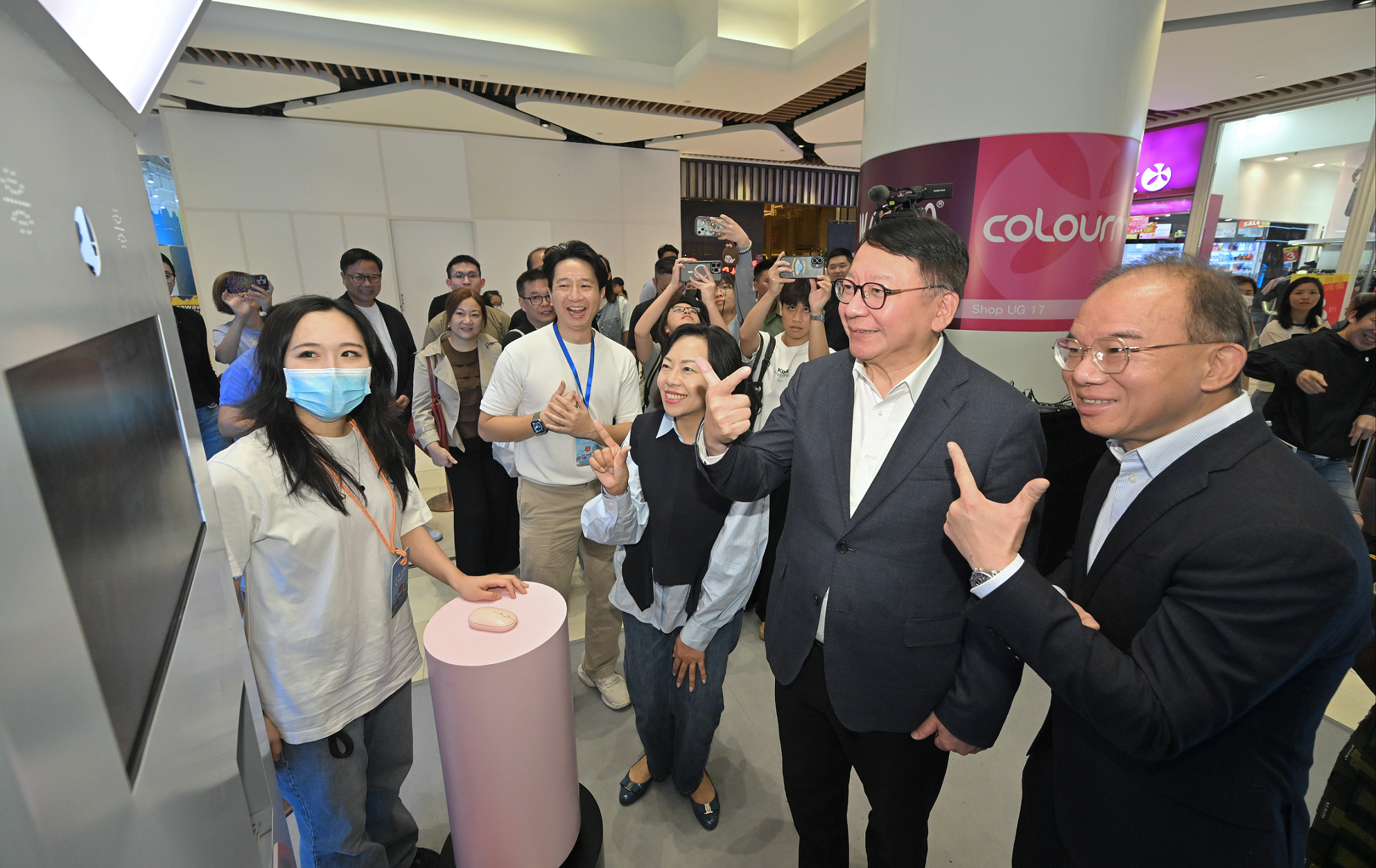 The Chief Secretary for Administration, Mr Chan Kwok-ki, today (October 26) attended the “Election into Community” Roving Interactive Exhibition@The Westwood event. Photo shows Mr Chan (second right) trying out the self-service photo booth together with the Secretary for Constitutional and Mainland Affairs, Mr Erick Tsang Kwok-wai (first right); and the Secretary for Home and Youth Affairs, Miss Alice Mak (third right).