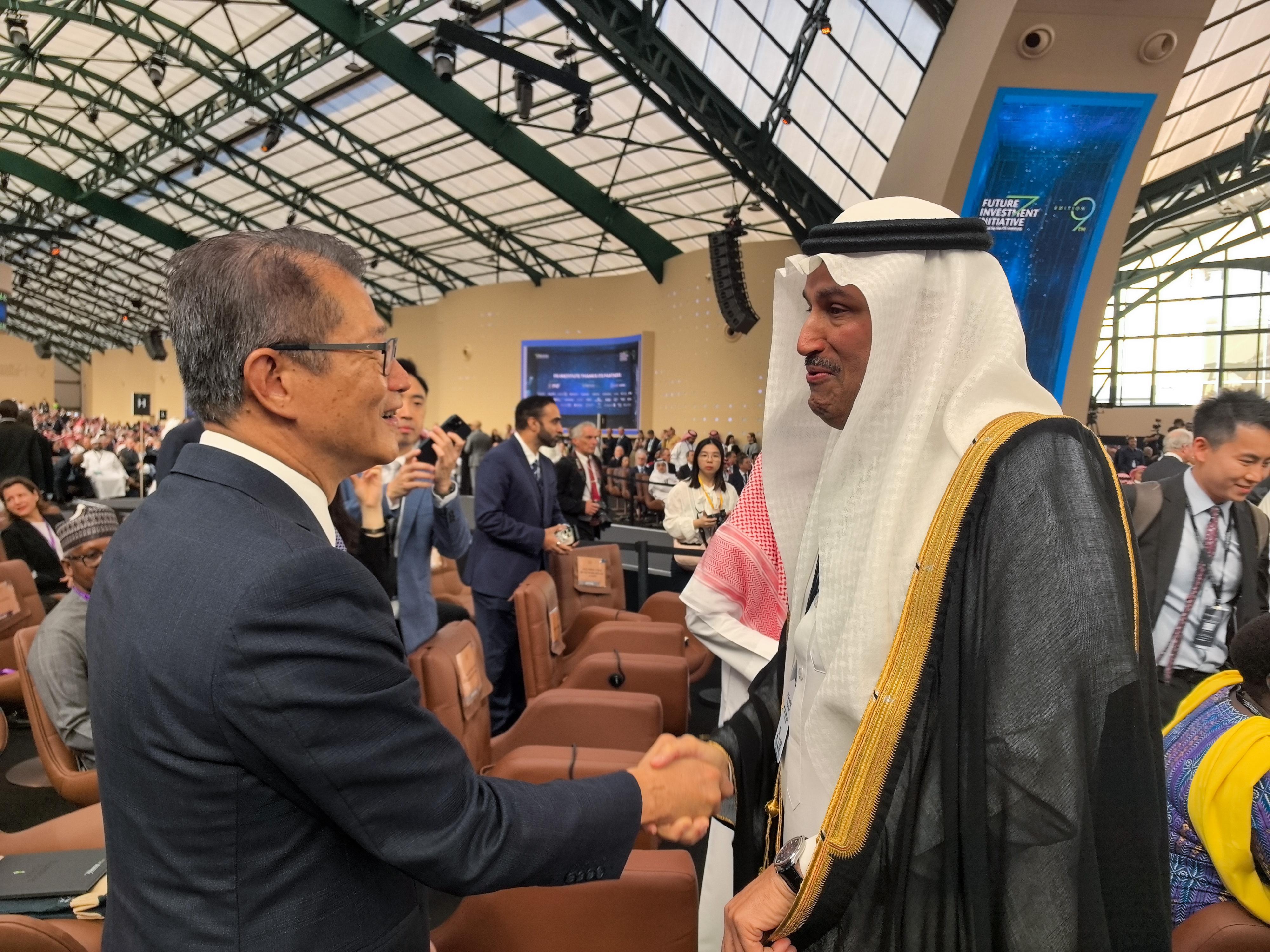 The Financial Secretary, Mr Paul Chan, led a delegation from the financial and innovation sectors on a visit to Riyadh, Saudi Arabia, on October 28 (Riyadh time). Photo shows Mr Chan (left) and other guest attending the Future Investment Initiative.