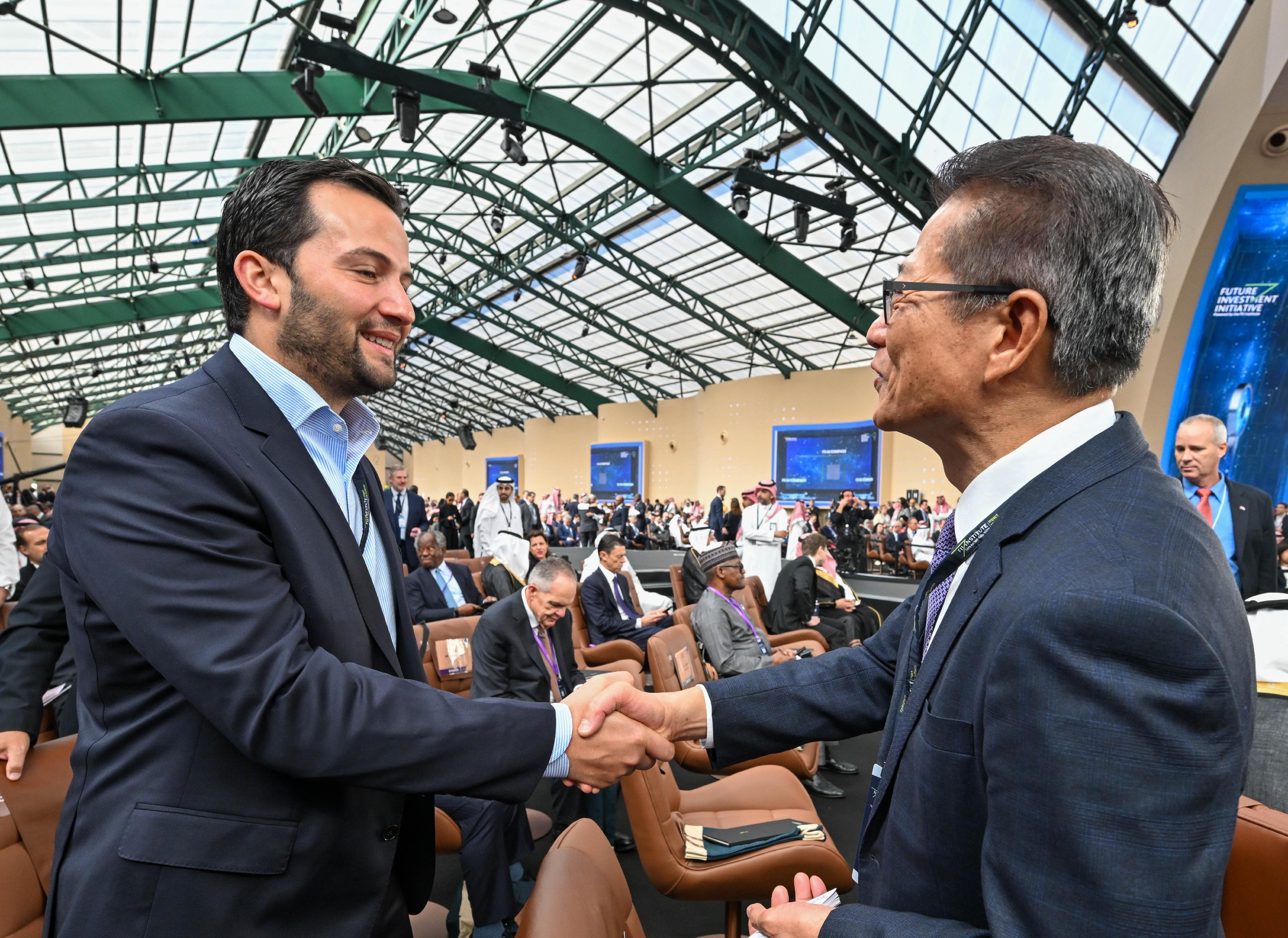 The Financial Secretary, Mr Paul Chan, led a delegation from the financial and innovation sectors on a visit to Riyadh, Saudi Arabia, on October 28 (Riyadh time). Photo shows Mr Chan (right) and other guest attending the Future Investment Initiative.
