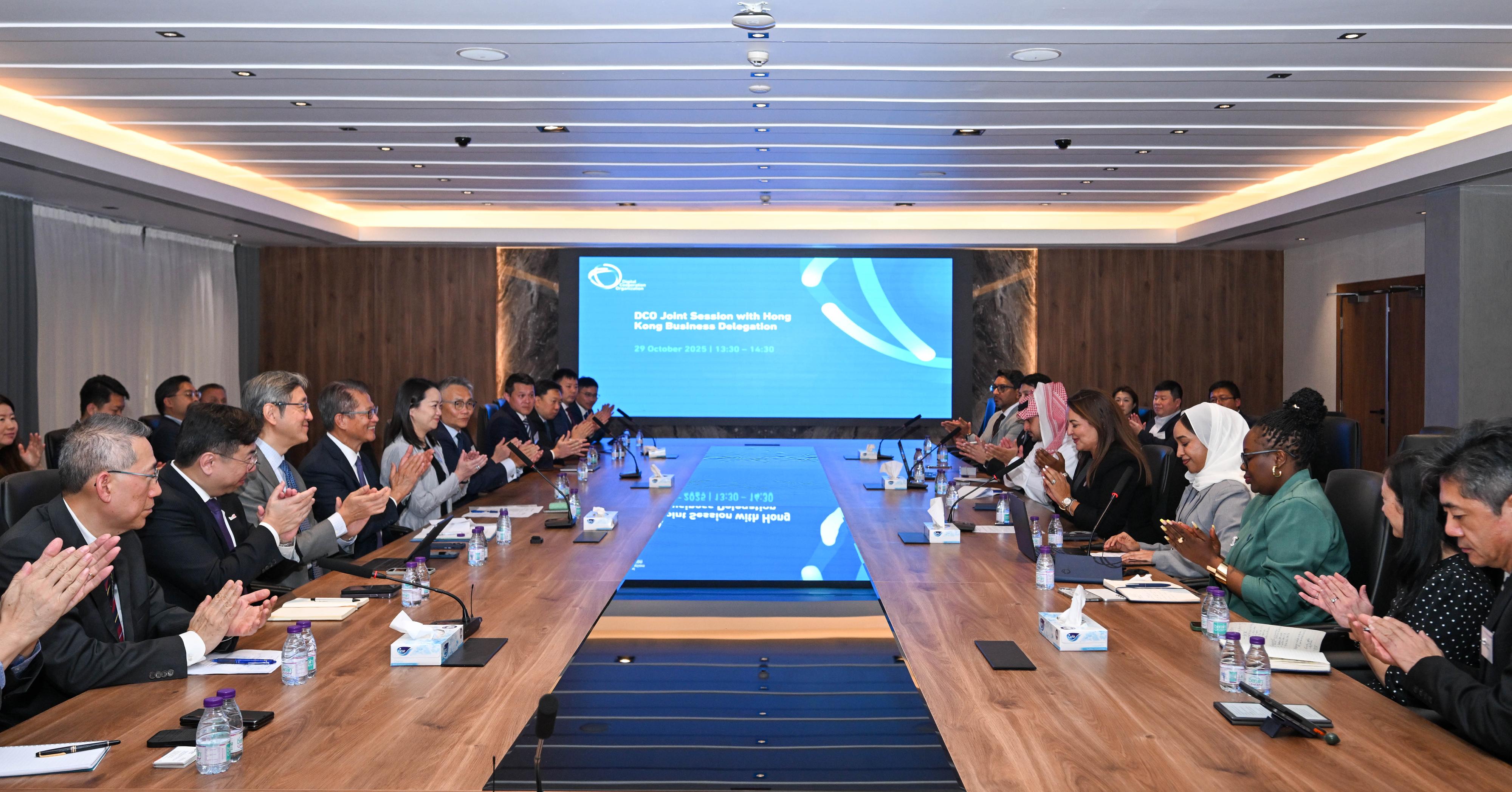 The Financial Secretary, Mr Paul Chan, led a delegation of the financial and innovation sectors to continue the visit to Riyadh, Saudi Arabia, on October 29 (Riyadh time). Photo shows Mr Chan (fourth left) meeting with the representatives of an intergovernmental organisation, Digital Cooperation Organization.