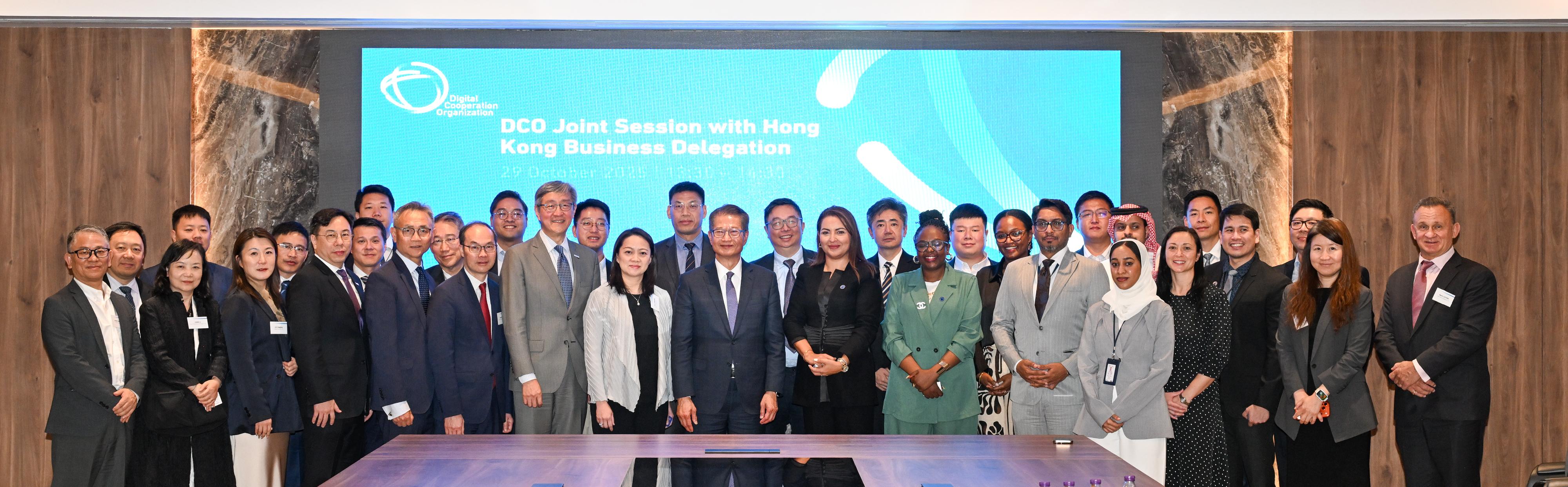 The Financial Secretary, Mr Paul Chan, led a delegation of the financial and innovation sectors to continue the visit to Riyadh, Saudi Arabia, on October 29 (Riyadh time). Photo shows Mr Chan (front row, ninth left) with the  representatives of an intergovernmental organisation, Digital Cooperation Organization. Next to him is the Director-General of the Digital Cooperation Organization, Dr Hajar El Haddaoui (front row, tenth left).
