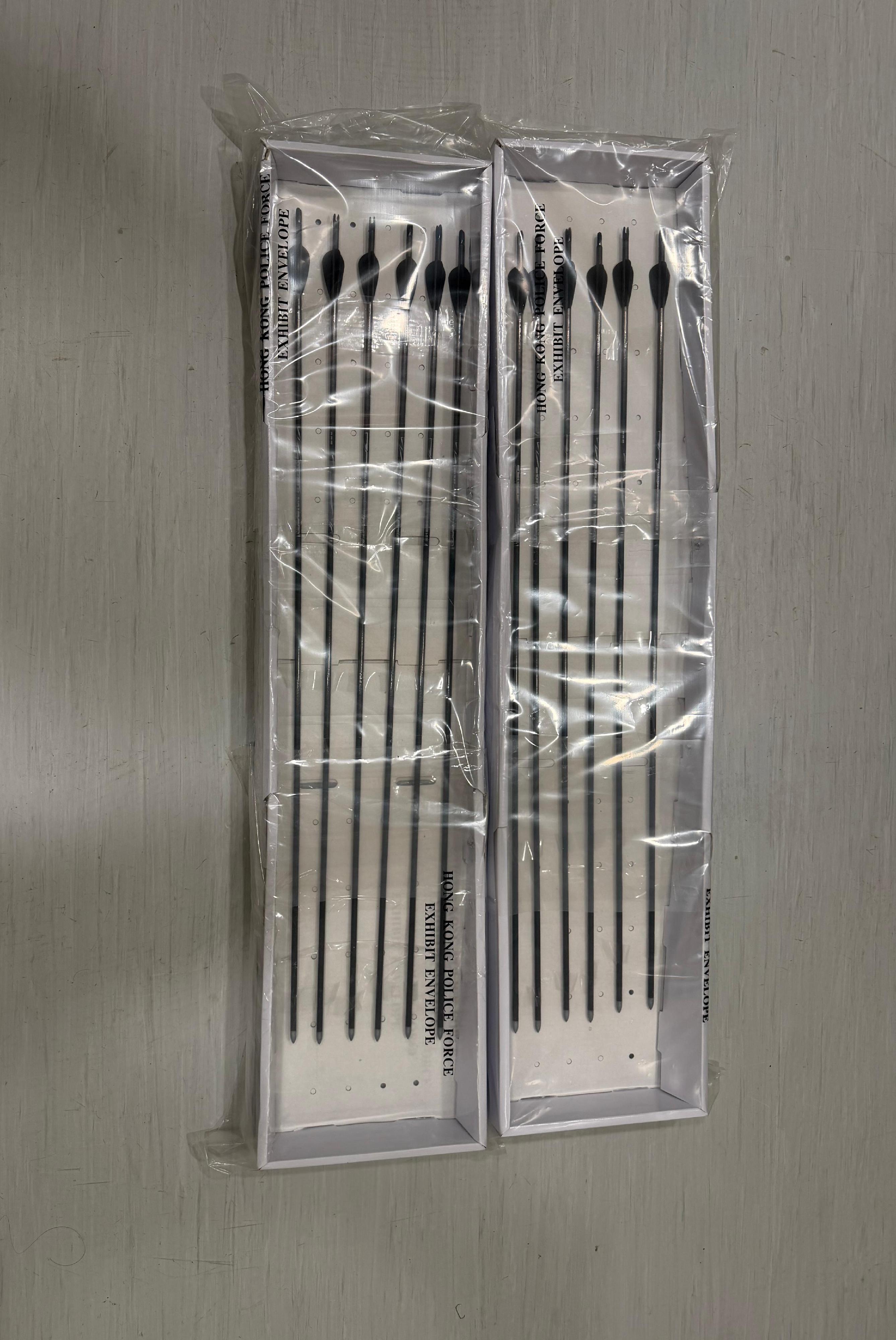 Police seized three compound bows with twelve arrows and two katanas during the operation.