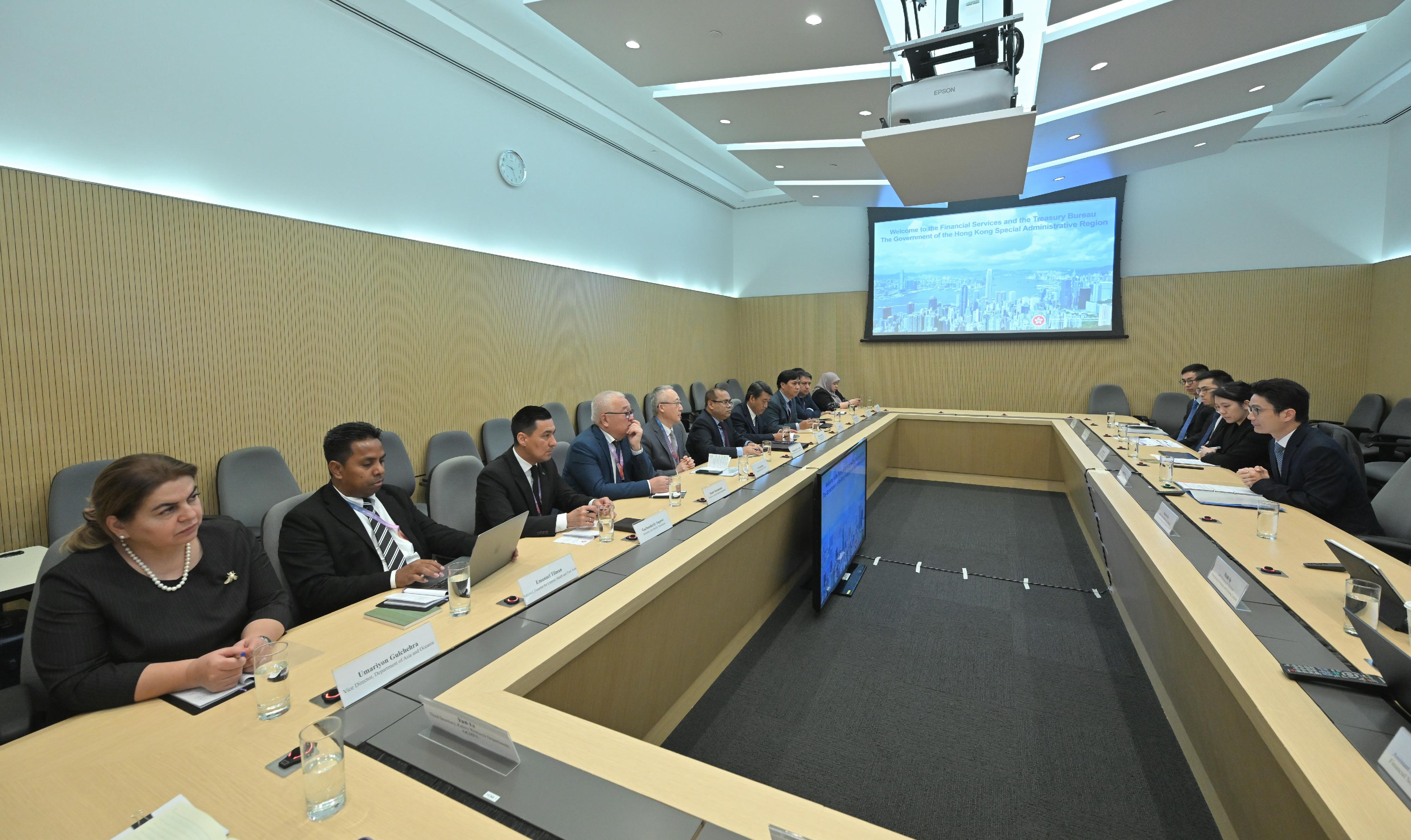 A delegation of 10 overseas government officials completed their visit to Hong Kong today (October 30). Photo shows the delegation meeting with the Under Secretary for Financial Services and the Treasury, Mr Joseph Chan (first right), to explore financial co-operation opportunities.