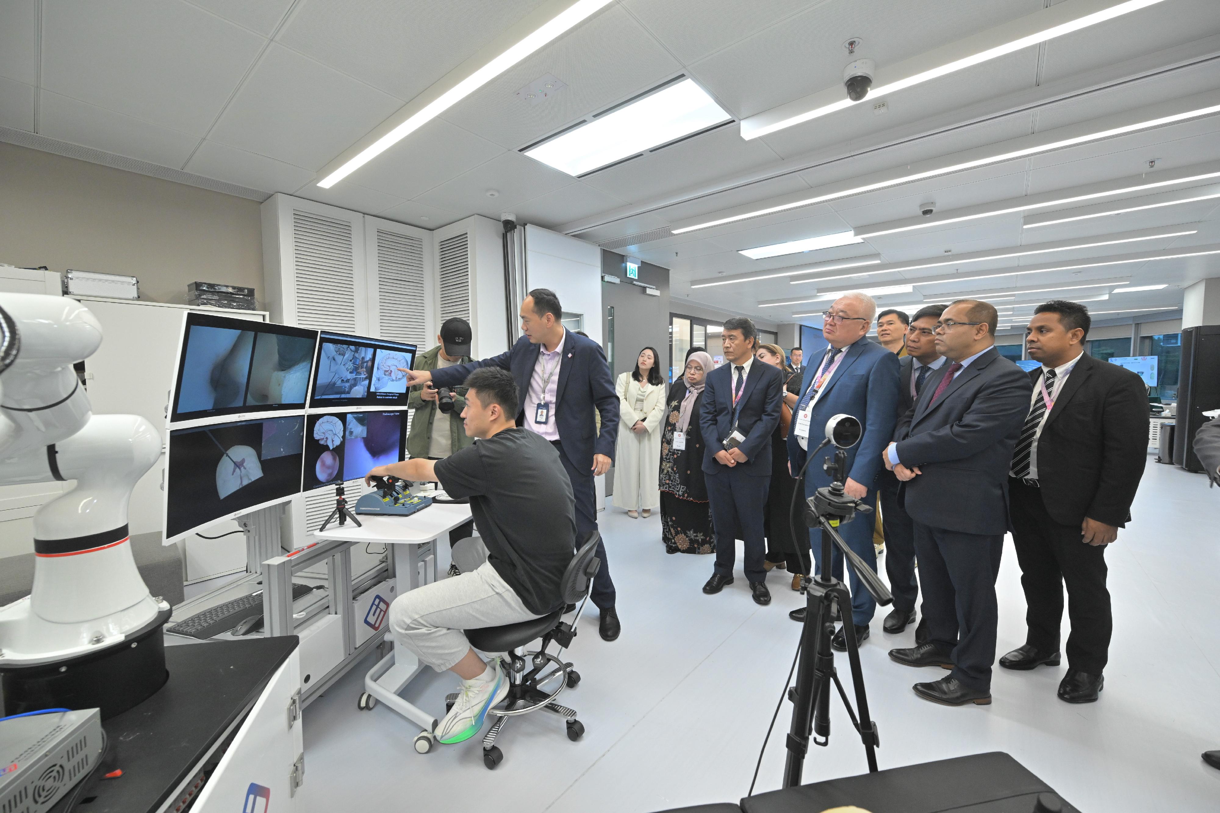 A delegation of 10 overseas government officials completed their visit to Hong Kong today (October 30). Photo shows the delegation visiting the Hong Kong Science Park.