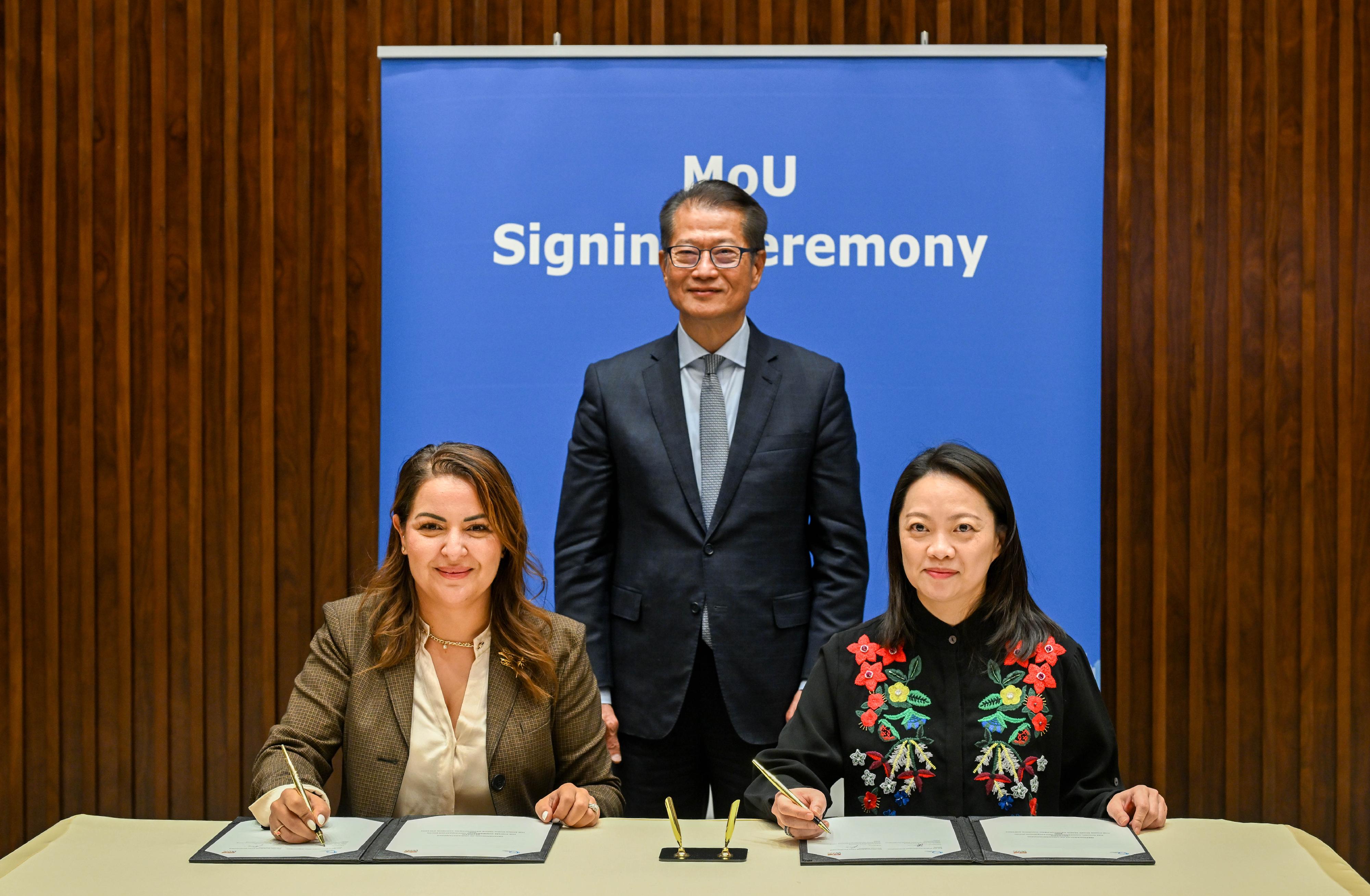 The Financial Secretary, Mr Paul Chan, continued to lead a delegation of the financial and innovation sectors to visit Riyadh, Saudi Arabia, on October 30 (Riyadh time). Photo shows Mr Chan (back row, centre) witnessing the signing of memoranda of understanding between Hong Kong Trade Development Council and Digital Cooperation Organization.