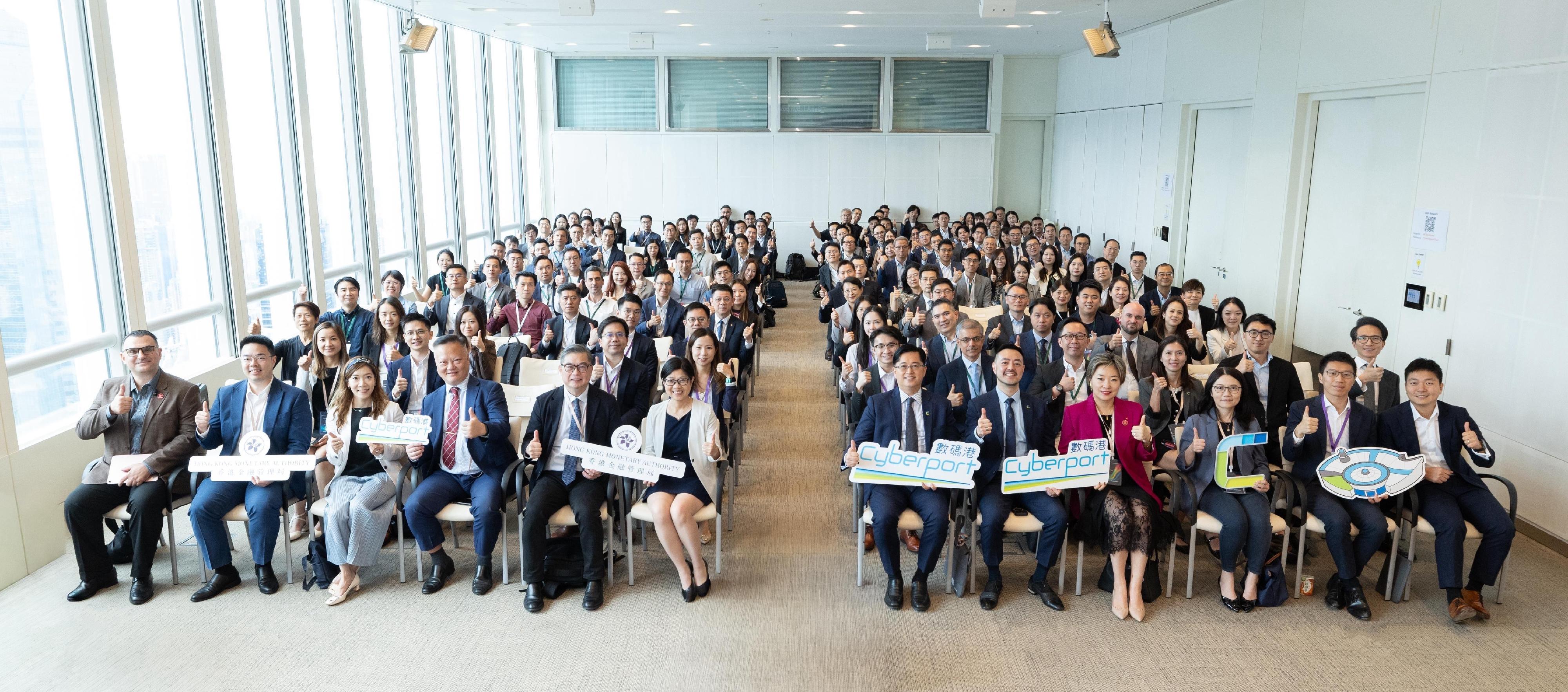 The Hong Kong Monetary Authority (HKMA), in collaboration with the Hong Kong Cyberport Management Company Limited (Cyberport), hosted the Generative Artificial Intelligence (GenA.I.) Symposium today (October 31). The GenA.I. Symposium brings together over 500 professionals from the financial and technology industries to foster collaboration and drive A.I. adoption. Photo shows the participating guests at the Symposium.