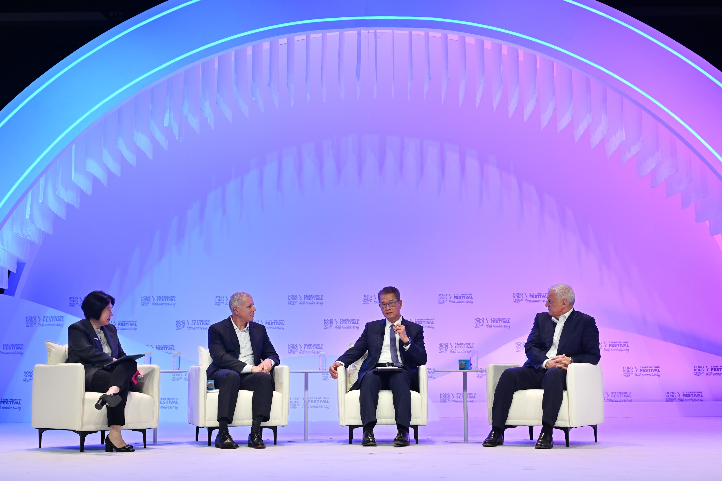 The Financial Secretary, Mr Paul Chan, attended Hong Kong FinTech Week x StartmeupHK Festival 2025 today (November 3). Photo shows Mr Chan (second right) and other guests having a panel discussion.