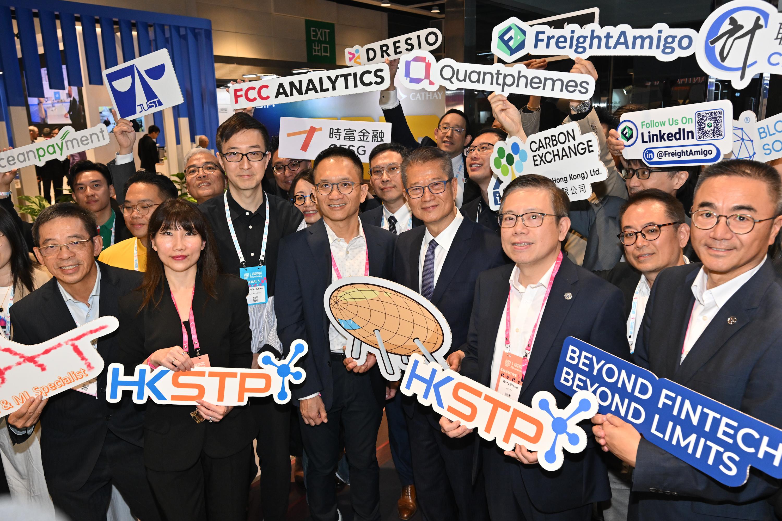 The Financial Secretary, Mr Paul Chan, attended Hong Kong FinTech Week x StartmeupHK Festival 2025 today (November 3). Photo shows Mr Chan (fourth right) visiting an exhibition booth.