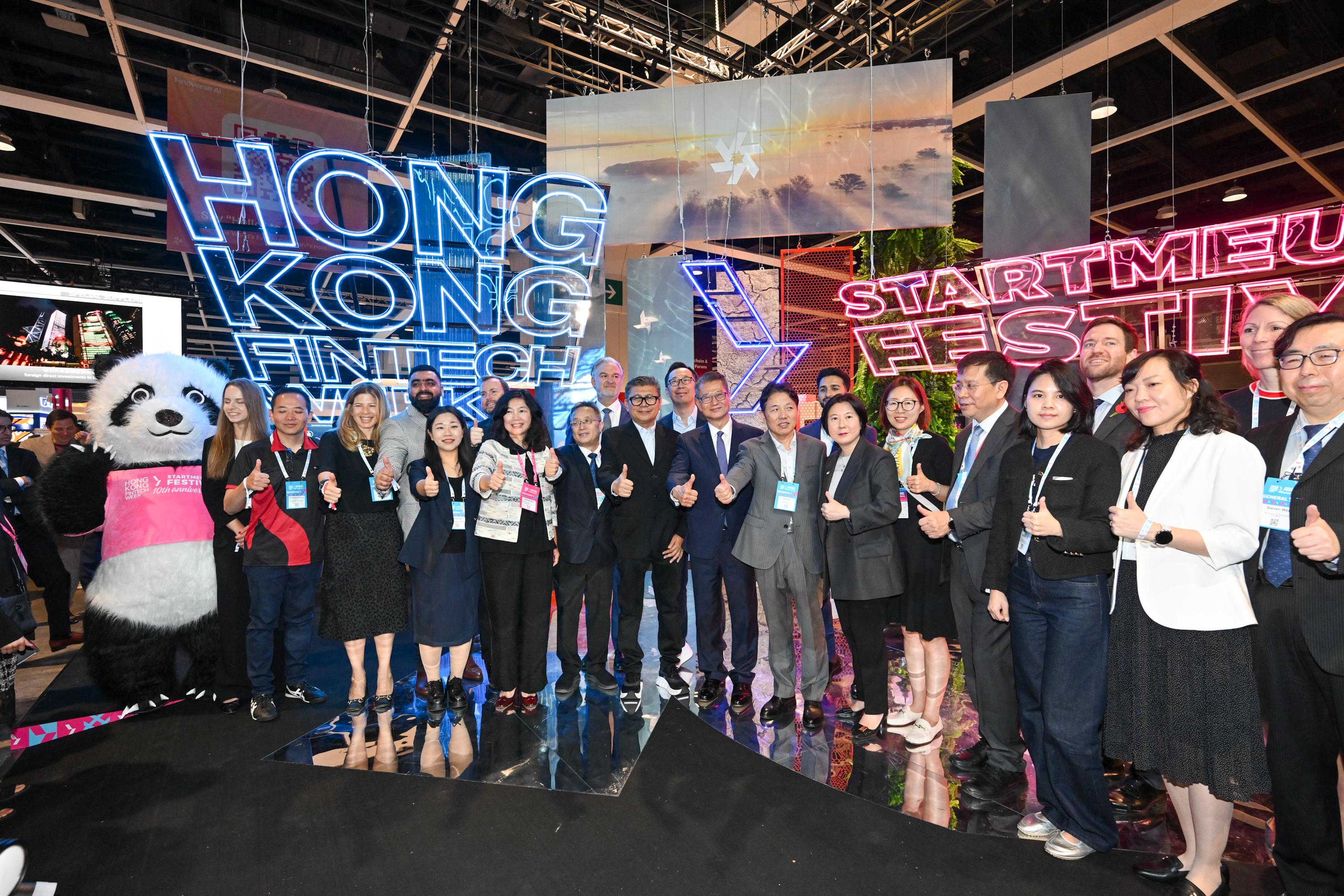 The Financial Secretary, Mr Paul Chan, attended Hong Kong FinTech Week x StartmeupHK Festival 2025 today (November 3). Photo shows Mr Chan (11th right) with other guests and participants.