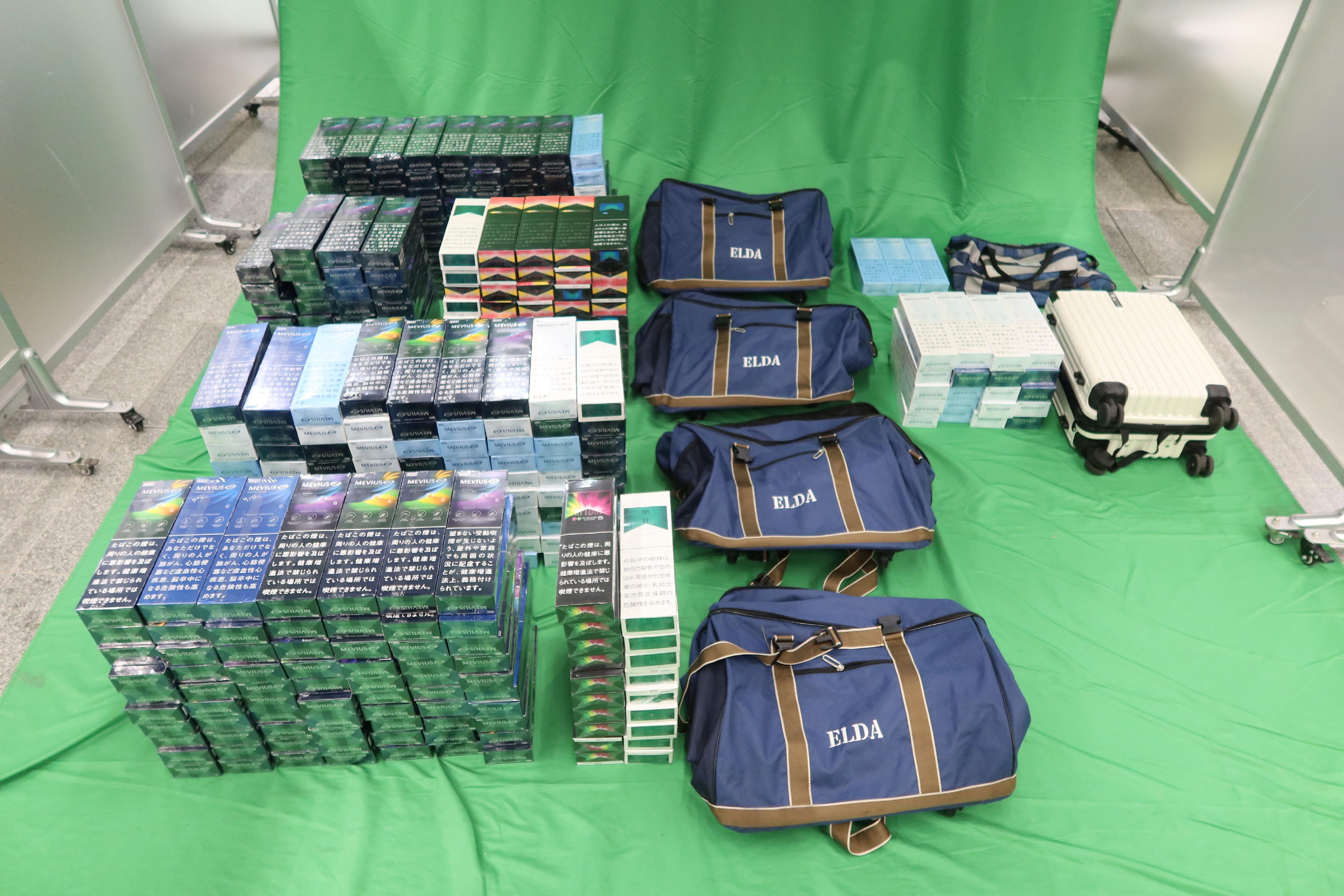 A 45-year-old incoming female passenger was sentenced to eight months' imprisonment and fined by the West Kowloon Magistrates' Courts today (November 4) for dealing with and importing duty-not-paid cigarettes and failing to declare them to Customs Officers, in contravention of the Dutiable Commodities Ordinance. Photo shows the duty-not-paid cigarettes seized.