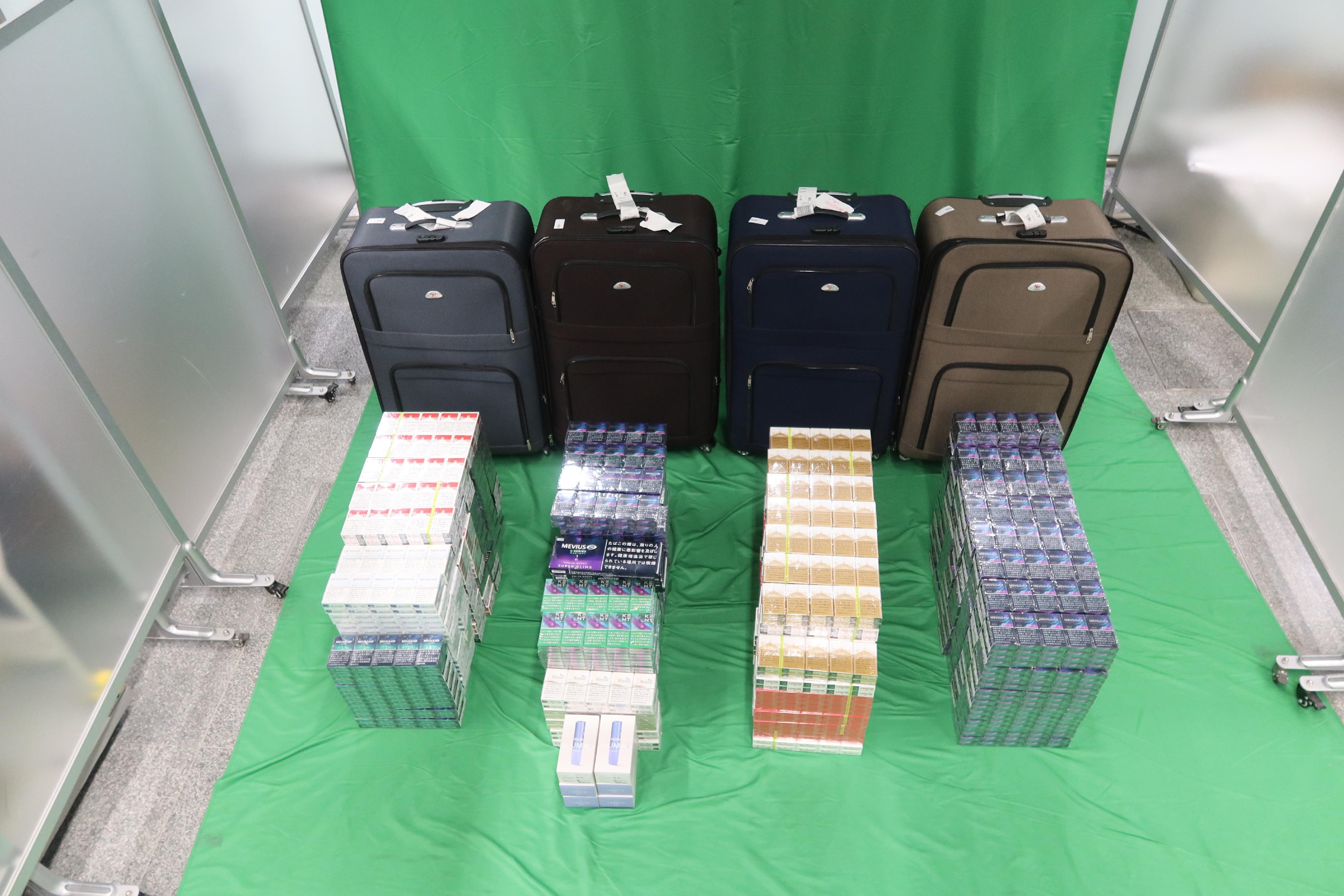 A 45-year-old incoming female passenger was sentenced to eight months' imprisonment and fined by the West Kowloon Magistrates' Courts today (November 4) for dealing with and importing duty-not-paid cigarettes and failing to declare them to Customs Officers, in contravention of the Dutiable Commodities Ordinance. Photo shows the duty-not-paid cigarettes seized.