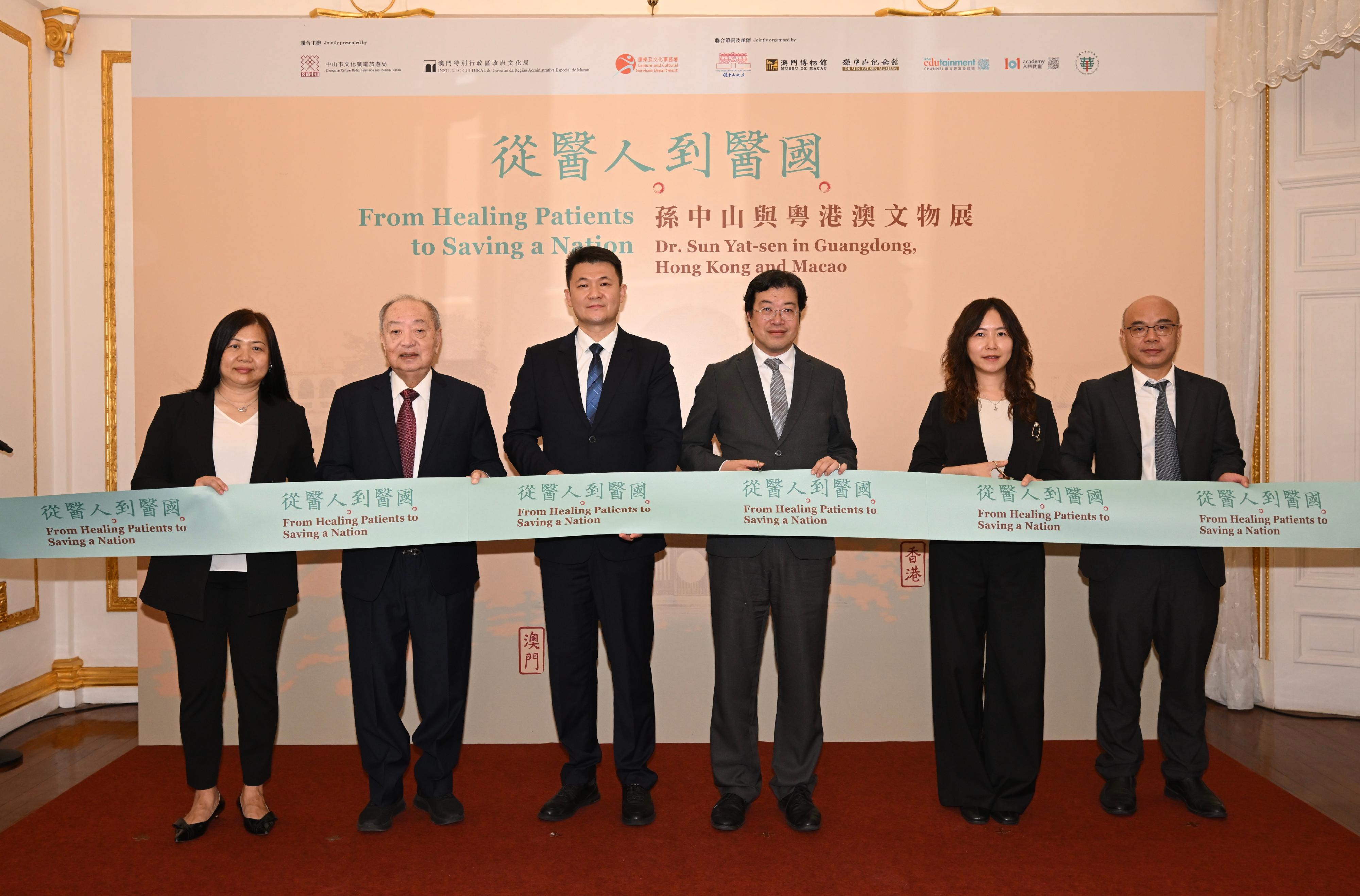 The Dr Sun Yat-sen Museum held the opening ceremony of the "From Healing Patients to Saving a Nation - Dr. Sun Yat-sen in Guangdong, Hong Kong and Macao" exhibition today (November 6). Photo shows officiating guests the Assistant Director (Heritage and Museums) of the Leisure and Cultural Services Department, Mr Ng Chi-wo (third right); the Deputy Director of Zhongshan Culture, Radio, Television and Tourism Bureau, Mr Gong Wei (third left); the Director of Macao Museum, Ms Lou Ho-ian (second right); the great grandnephew of Dr Sun Yat-sen and Museum Expert Adviser, Mr Peter B Sun (second left); the Director of The Museum of Dr. Sun Yat-sen, Mr Wu Chunning (first right); and the Museum Director of the Hong Kong Museum of History, Ms Joyce Ho (first left).