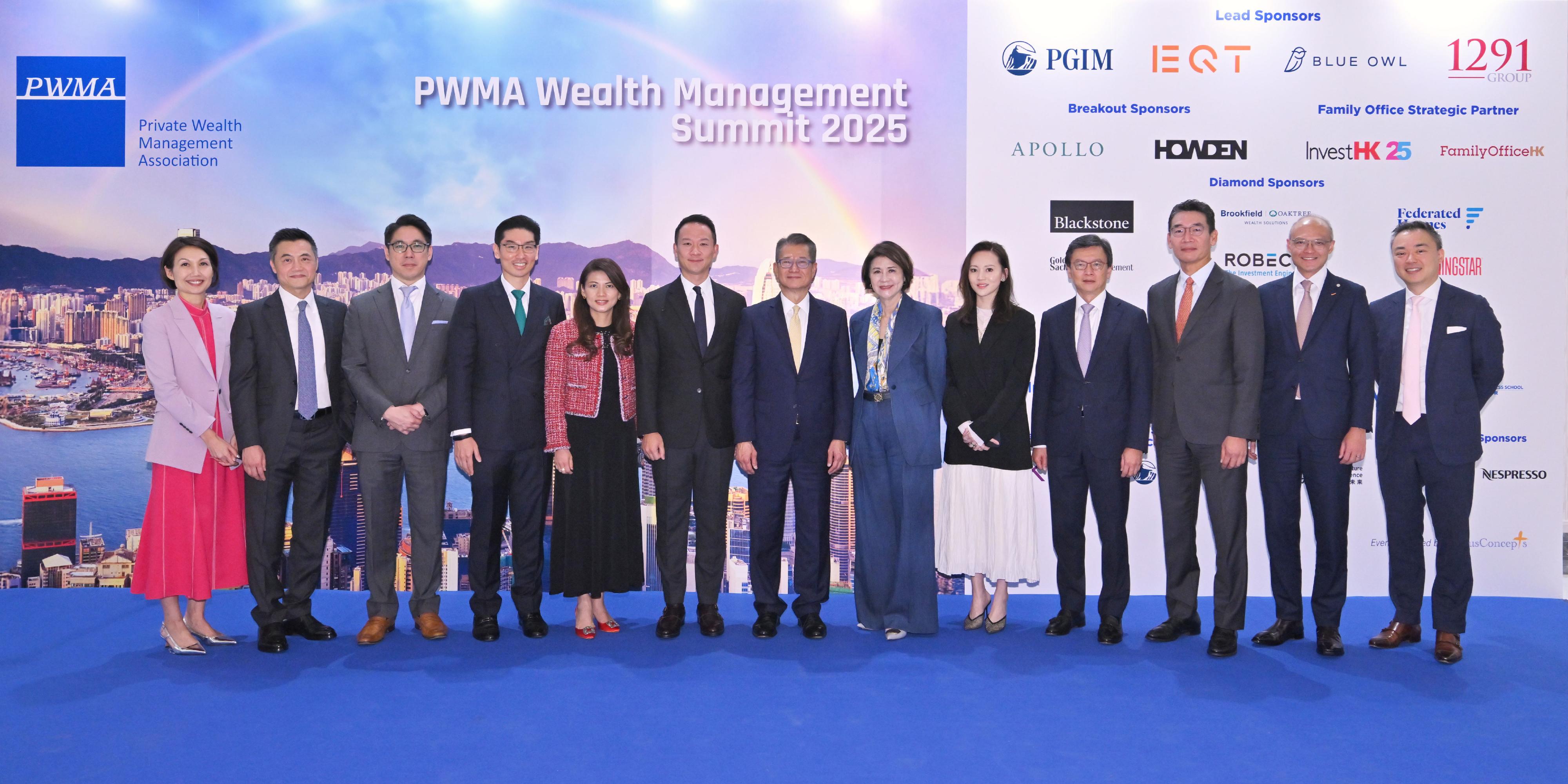 The Financial Secretary, Mr Paul Chan, attended the PWMA (Private Wealth Management Association) Wealth Management Summit 2025 today (November 6). Photo shows Mr Chan (centre); the Chairman of the Executive Committee of PWMA, Ms Amy Lo (sixth right); the Chief Executive Officer and Managing Director of PWMA, Ms Vivien Khoo (first left), and other guests at the event.
