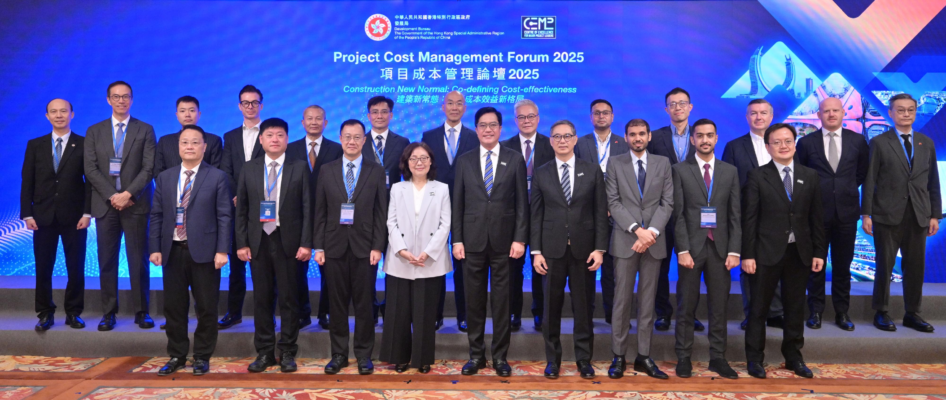 The Development Bureau (DEVB) held the Project Cost Management Forum 2025 today (November 7). With the theme “Construction New Normal: Co-defining Cost-effectiveness”, the forum explored how to enhance the cost management and cost-effectiveness of construction projects through optimised procurement strategies and the application of innovative technologies. Photo shows the Deputy Financial Secretary, Mr Michael Wong (front row, centre); the Secretary for Development, Ms Bernadette Linn (front row, fourth left); the Permanent Secretary for Development (Works), Mr Ricky Lau (front row, fourth right); and the Head of the Project Strategy and Governance Office of the Development Bureau, Mr Joseph Lo (front row, first right), with moderators and speakers of various sessions.