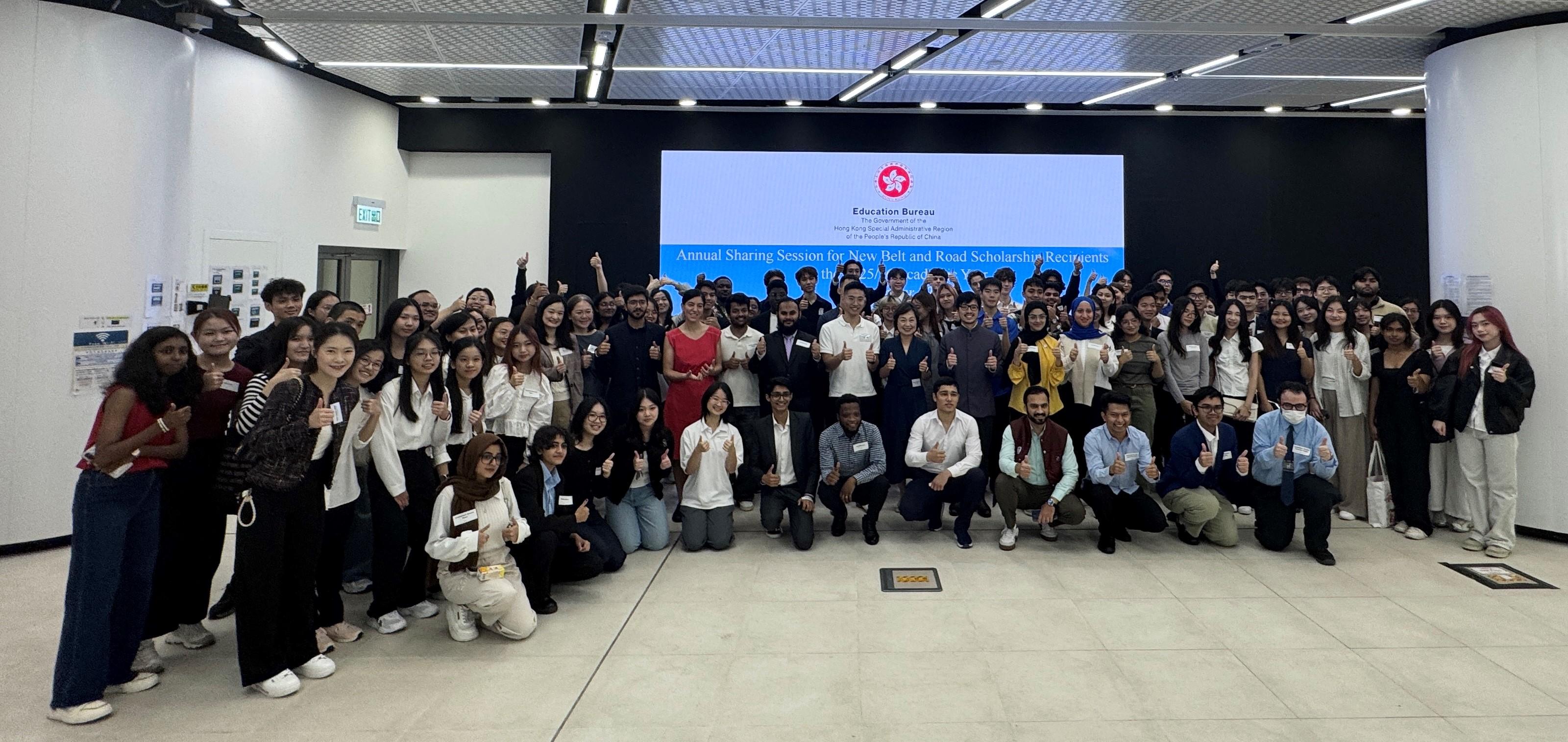 The annual sharing session for new Belt and Road Scholarship recipients was held today (November 8). Photo shows the Secretary for Education, Dr Choi Yuk-lin (second row, eleventh right), and the Commissioner for Belt and Road, Mr Nicholas Ho (second row, tenth right), in a group photo with attendees at the sharing session.