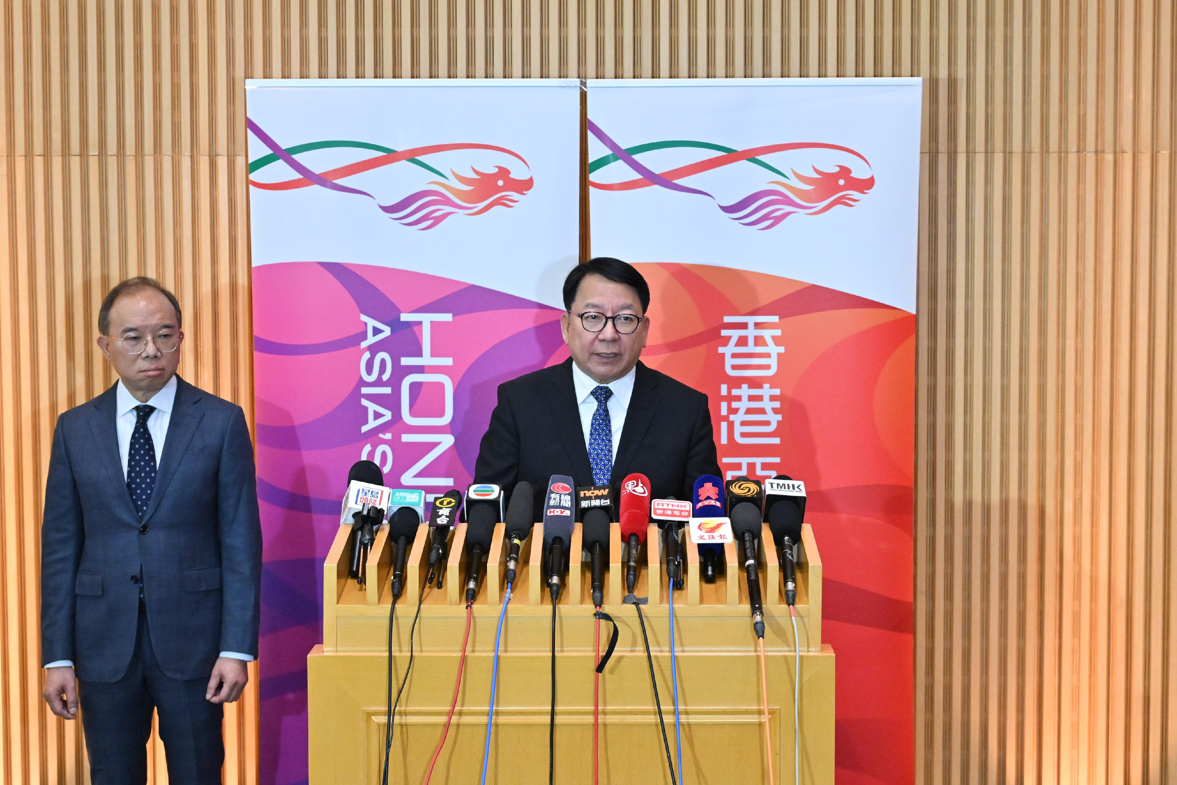 The Chief Secretary for Administration, Mr Chan Kwok-ki (right), together with the Secretary for Constitutional and Mainland Affairs, Mr Erick Tsang Kwok-wai (left), meets the media on the determination results of the Candidate Eligibility Review Committee on the 2025 Legislative Council General Election today (November 10).