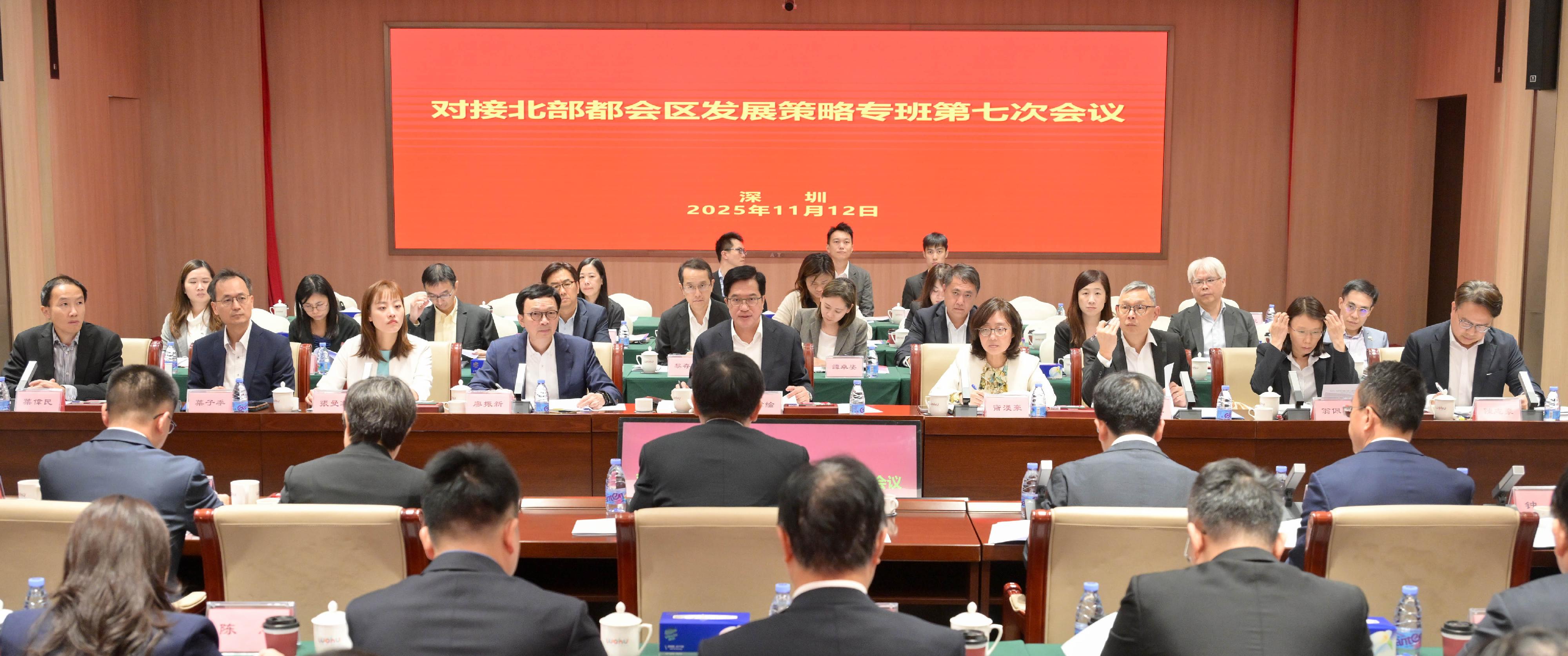 The Deputy Financial Secretary, Mr Michael Wong (front row, centre), and Vice Mayor of the Shenzhen Municipal People's Government Mr Tao Yongxin, leading delegations of the governments of the Hong Kong Special Administrative Region (HKSAR) and Shenzhen respectively, held a meeting of the Task Force for Collaboration on the Northern Metropolis Development Strategy in Shenzhen today (November 12). Officials of the HKSAR Government attending the meeting today included the Secretary for Development, Ms Bernadette Linn (front row, fourth right); the Under Secretary for Transport and Logistics, Mr Liu Chun-san (front row, fourth left); the Under Secretary for Security, Mr Michael Cheuk (front row, third right); the Under Secretary for Innovation, Technology and Industry, Ms Lillian Cheong (front row, third left), as well as the heads of relevant departments.