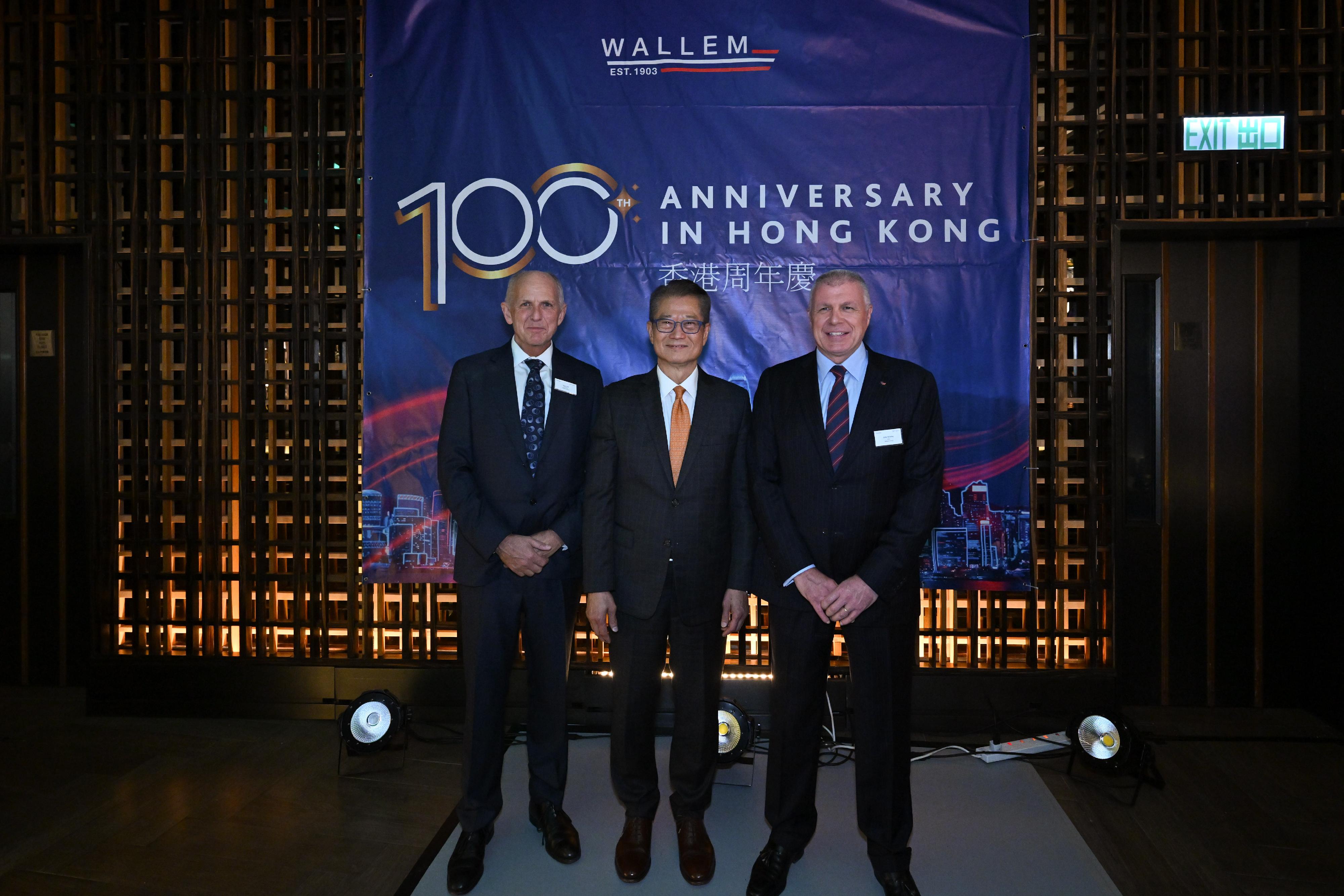 The Financial Secretary, Mr Paul Chan, attended the Wallem Group's 100th anniversary celebration in Hong Kong today (November 12). Photo shows (from left) the Chairman of the Wallem Group, Mr Nigel Hill; Mr Chan, and the Chief Executive Officer of the Wallem Group, Mr John Rowley, at the event.