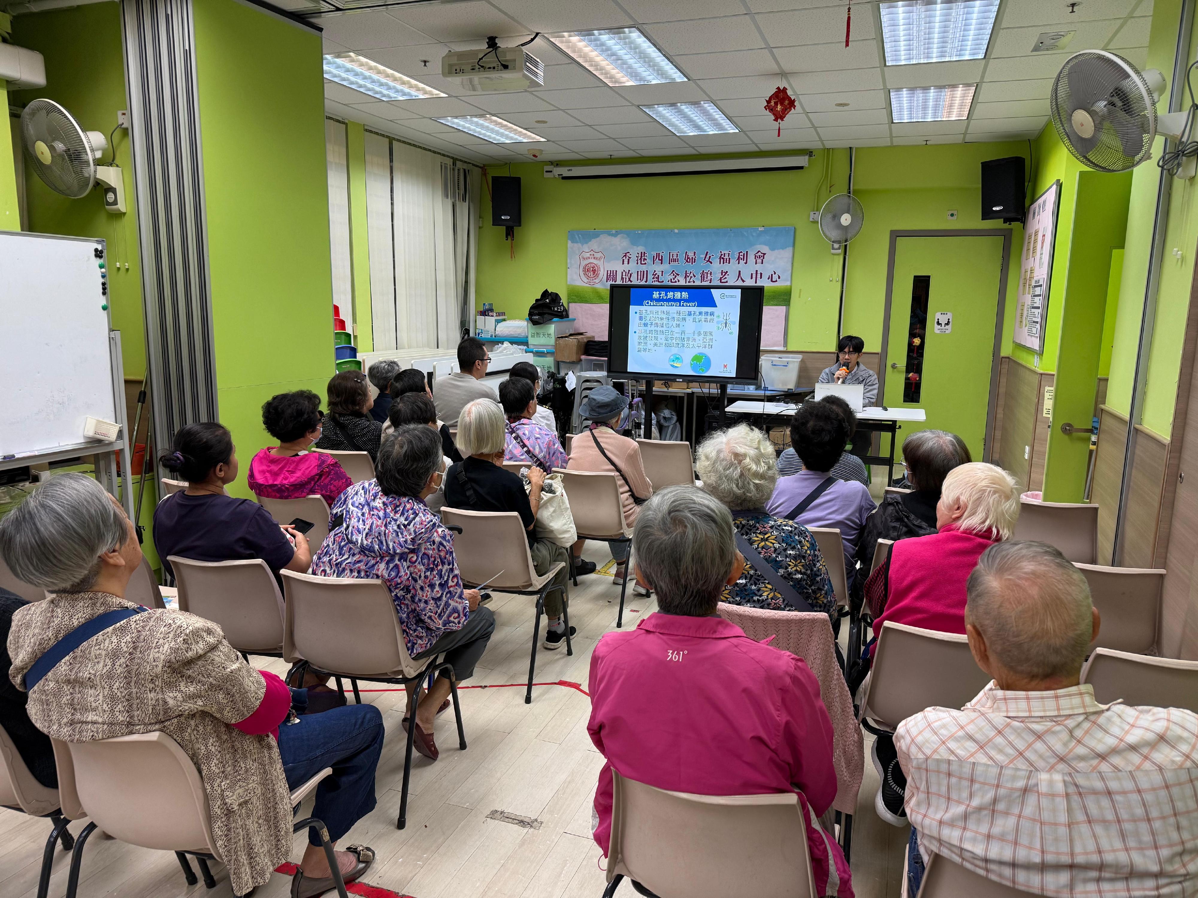 The Centre for Health Protection (CHP) of the Department of Health today (November 14) continued to implement various prevention and control measures together with various government departments and relevant organisations near Tung Hei Court in Shau Kei Wan, striving to prevent Chikungunya fever from taking root locally and minimise the public health impact of the disease in Hong Kong. Photo shows the CHP and the Eastern District Office holding a health talk on CF prevention at the Kwan Kai Ming Memorial Chung Hok Elderly Centre of Women's Welfare Club Western District Hong Kong on G/F, Hing Hong House, Hing Tung Estate.
