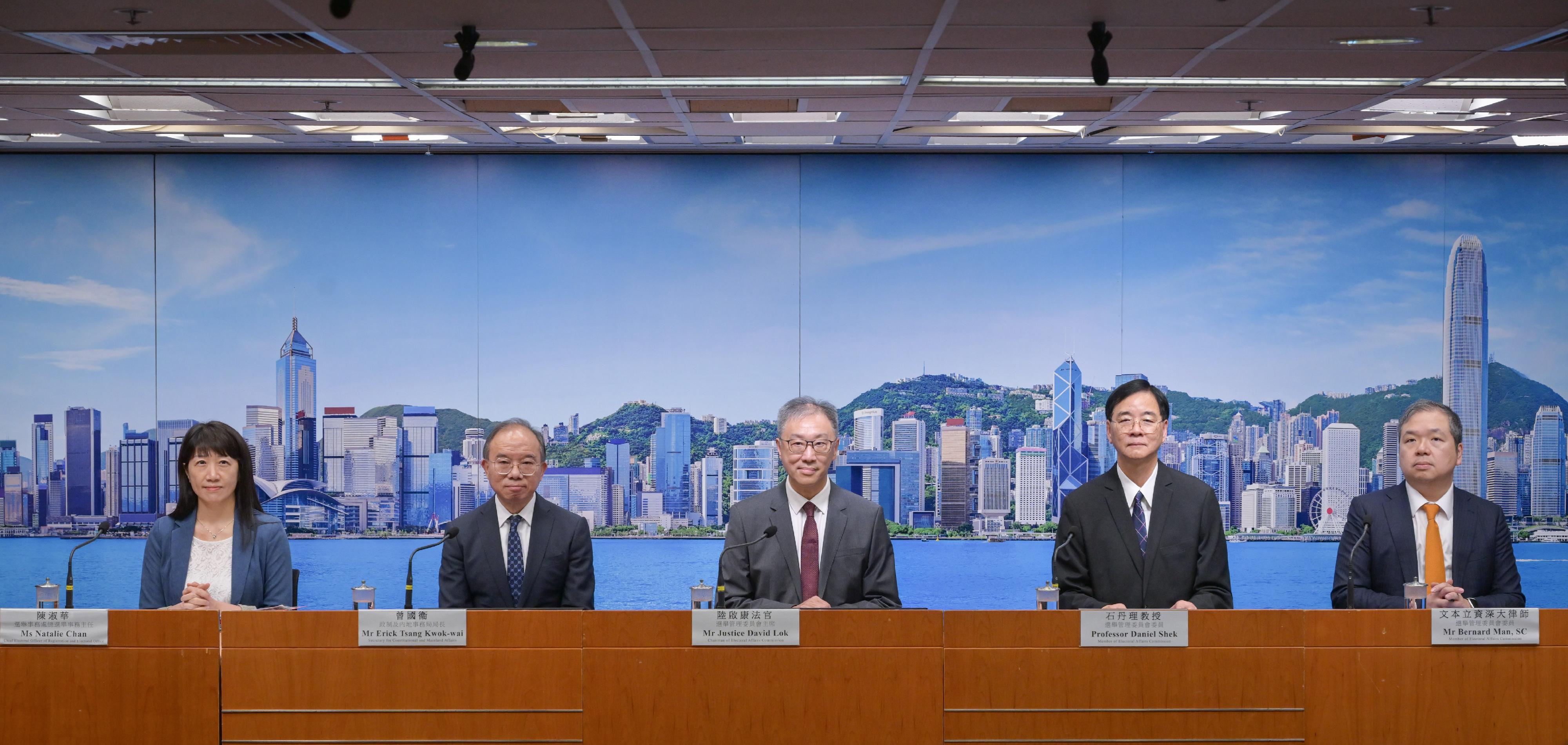 The Electoral Affairs Commission (EAC), the Constitutional and Mainland Affairs Bureau and the Registration and Electoral Office (REO) held a press conference today (November 14) on the new polling arrangements for the 2025 Legislative Council General Election. Photo shows (from left) the Chief Electoral Officer of the REO, Ms Natalie Chan; the Secretary for Constitutional and Mainland Affairs, Mr Erick Tsang Kwok-wai; the EAC Chairman, Mr Justice David Lok; and EAC members Professor Daniel Shek and Mr Bernard Man, SC.
