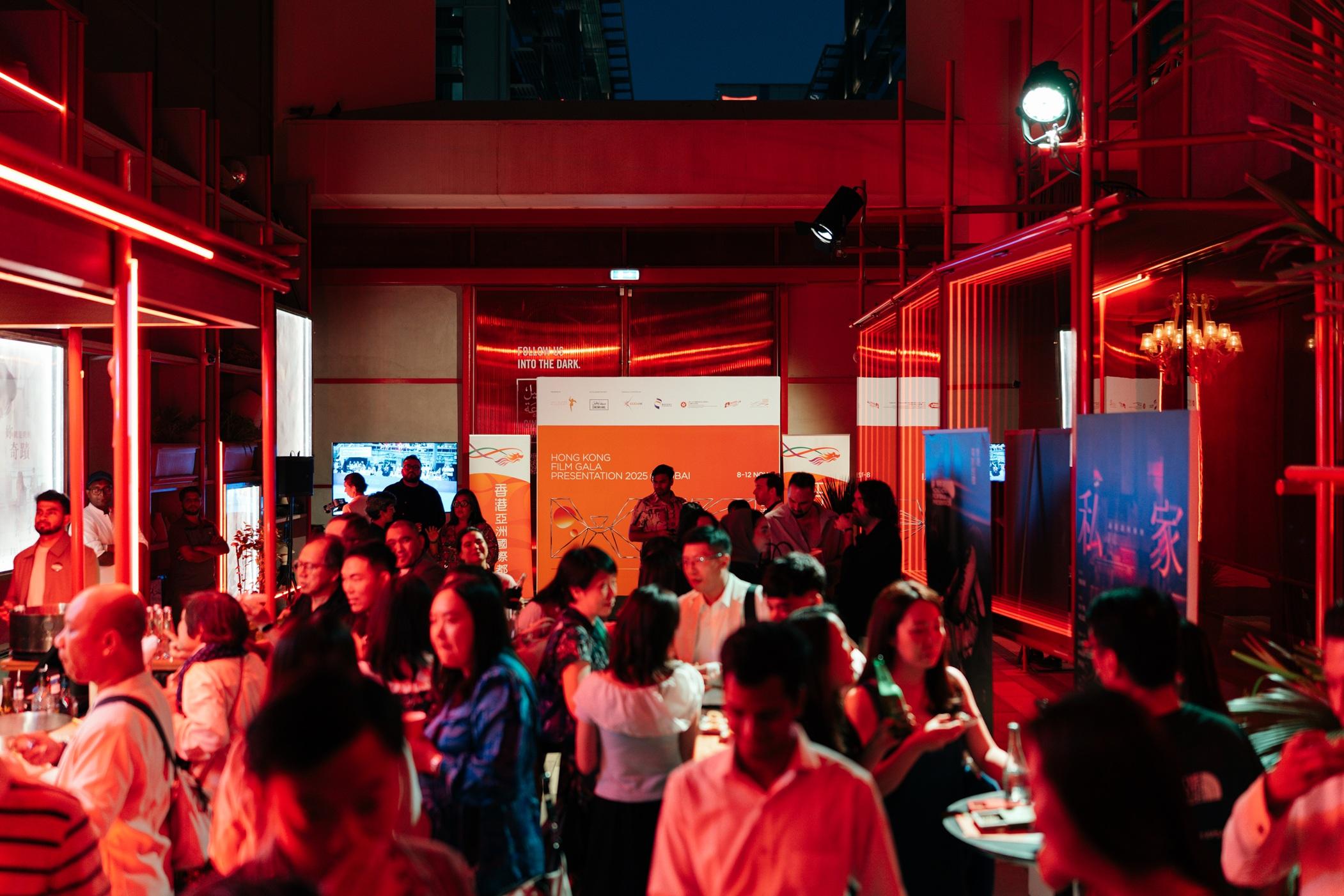 The Hong Kong Film Gala Presentation returned to Dubai, the United Arab Emirates, from November 8 to 12, to showcase a selection of seven new and classic Hong Kong films to local audiences. Photo shows local film enthusiasts exchanging views during the opening reception.

