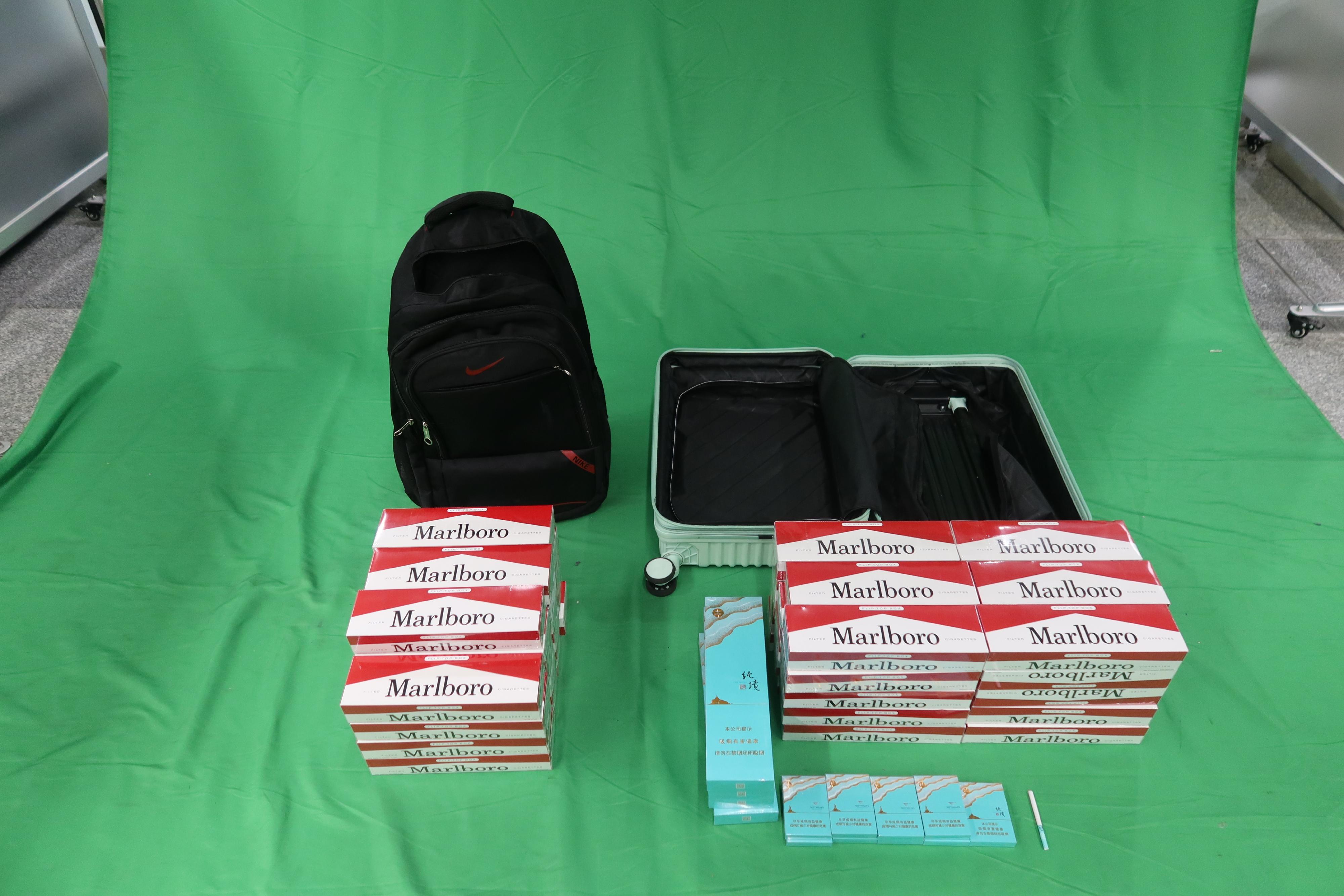 A 55-year-old incoming male passenger was sentenced to two months' imprisonment and fined $1,000 by the West Kowloon Magistrates' Courts today (November 19) for possessing duty-not-paid cigarettes and failing to declare them to Customs officers, in contravention of the Dutiable Commodities Ordinance. Photo shows the duty-not-paid cigarettes seized.