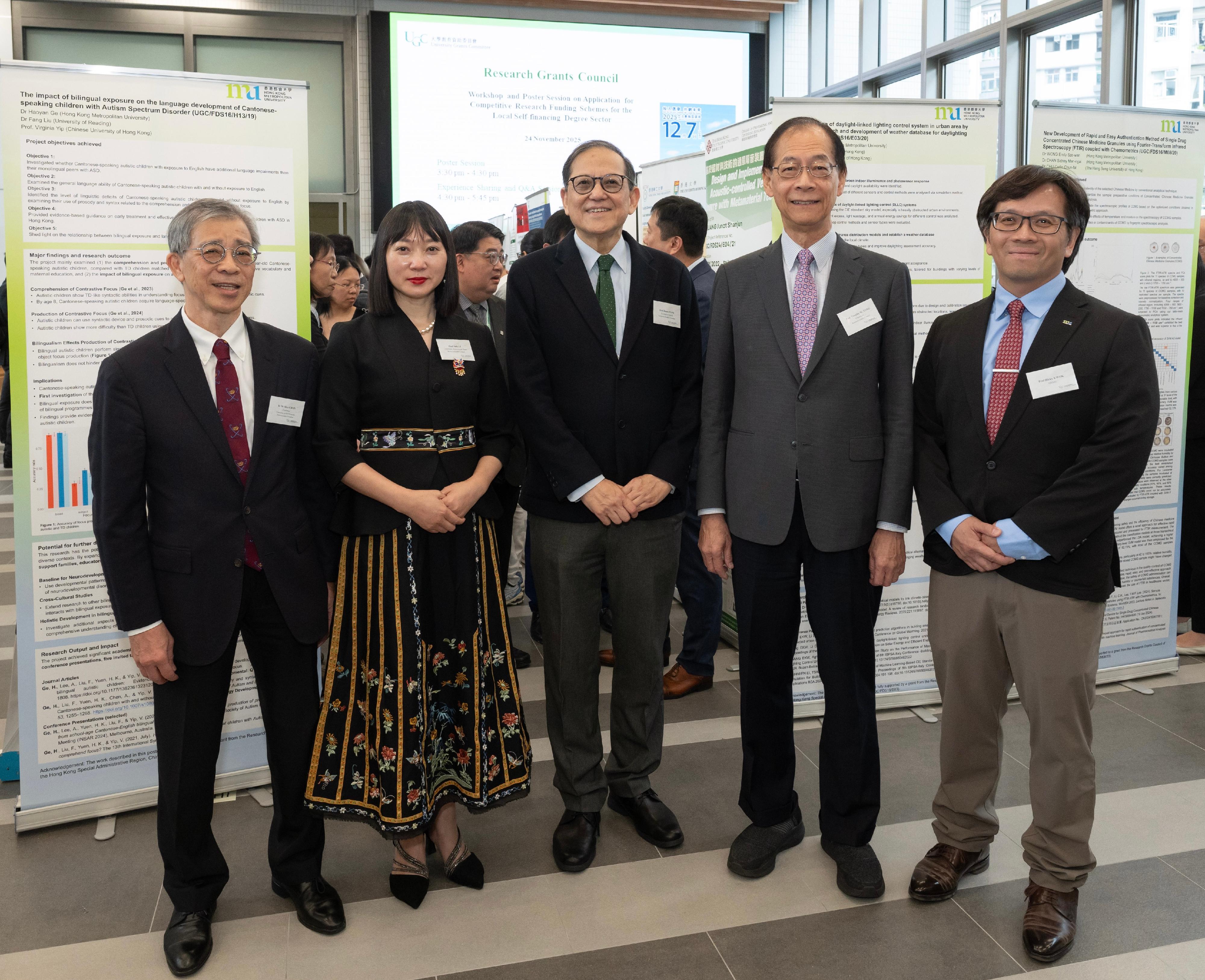 The Chairman of the Research Grants Council (RGC), Professor Timothy W. Tong (second right); the Secretary-General of the University Grants Committee, Professor James Tang (centre); the Chairman of the Committee on Self-financing Post-secondary Education, Dr Alex Chan (first left); the Chairman of the Assessment Panel of the Competitive Research Funding Schemes for the Local Self-financing Degree Sector, Professor Julie Li (second left); and the Vice President (Research and Institutional Advancement) of Hong Kong Metropolitan University, Professor Ricky Kwok (first right), attend a poster session showcasing the research achievements of the completed RGC Faculty Development Scheme projects today (November 24).