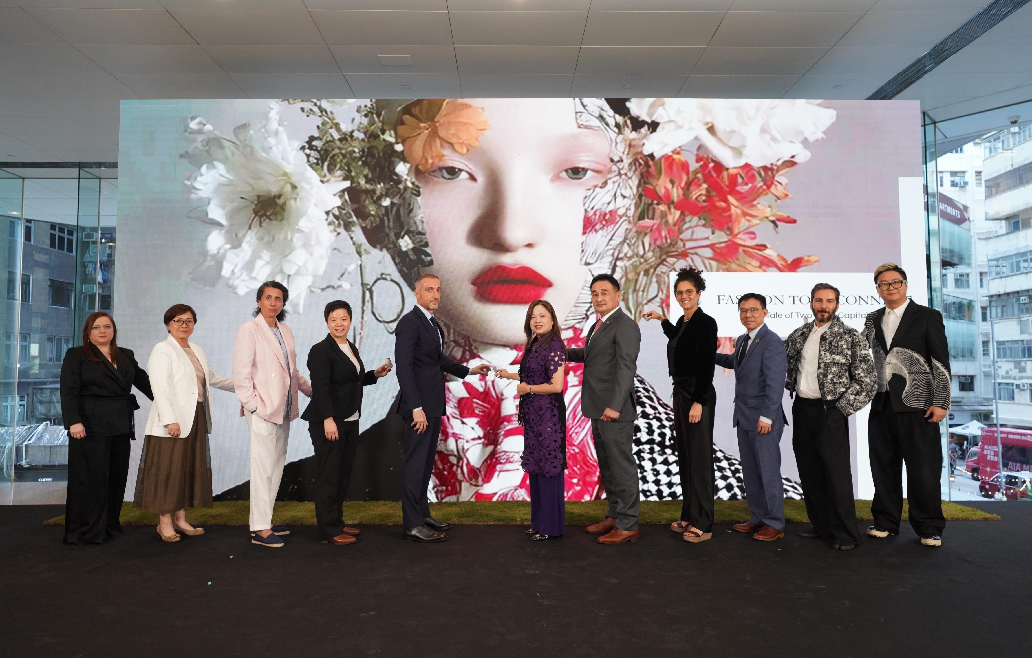 Presented by the Government of the Hong Kong Special Administrative Region, spearheaded and sponsored by the Cultural and Creative Industries Development Agency of the Culture, Sports and Tourism Bureau, the second edition of Hong Kong Fashion Fest today (November 25) presented the flagship programme crossover with Milan Fashion Week "Fashion to Reconnect: A Tale of Two Style Capitals". Photo shows the Secretary for Culture, Sports and Tourism, Miss Rosanna Law (centre); the Consul General of Italy to Hong Kong and Macao, Mr Carmelo Ficarra (fifth left); the Vice President (Talent and International Strategy) of City University of Hong Kong, Professor Li Wen-jung (fifth right); Co-Founder of Fondazione Pistoletto Cittadellarte of Italy Mr Armona Pistoletto (fourth right); International New Talent and Brands Ambassador of Camera Nazionale della Moda Italiana Ms Sara Sozzani Maino (third left) and other guests officiating at the opening ceremony.