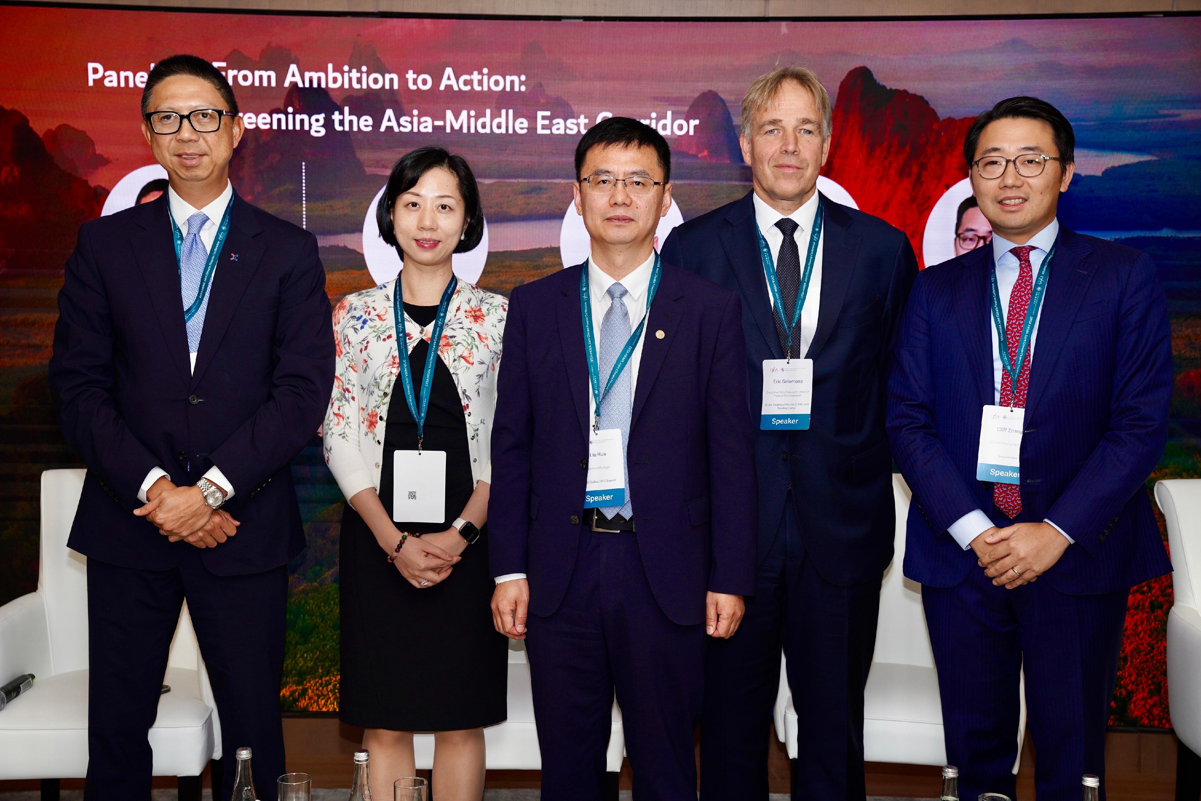 The Dubai Financial Services Authority and the Hong Kong Monetary Authority today (November 26) hosted the second Joint Climate Finance Conference in Dubai. Photo shows (from left) the Group General Counsel and Group Chief Sustainability Officer of the HKEX, Mr Paul Chow; the Managing Director and Head of Sustainable Finance of Greater China and North Asia of the Standard Chartered Bank, Ms Gan Luying; the General Manager of the DIFC Branch of ICBC Dubai, Mr Liu Hua; the Executive Vice President and Head of Product Development of Dubai Financial Market and Nasdaq Dubai, Mr Eric Salomons; and the CEO and Founding Partner of the Templewater, Mr Cliff Zhang, exchanging views on how to green the Asia-Middle East corridor.