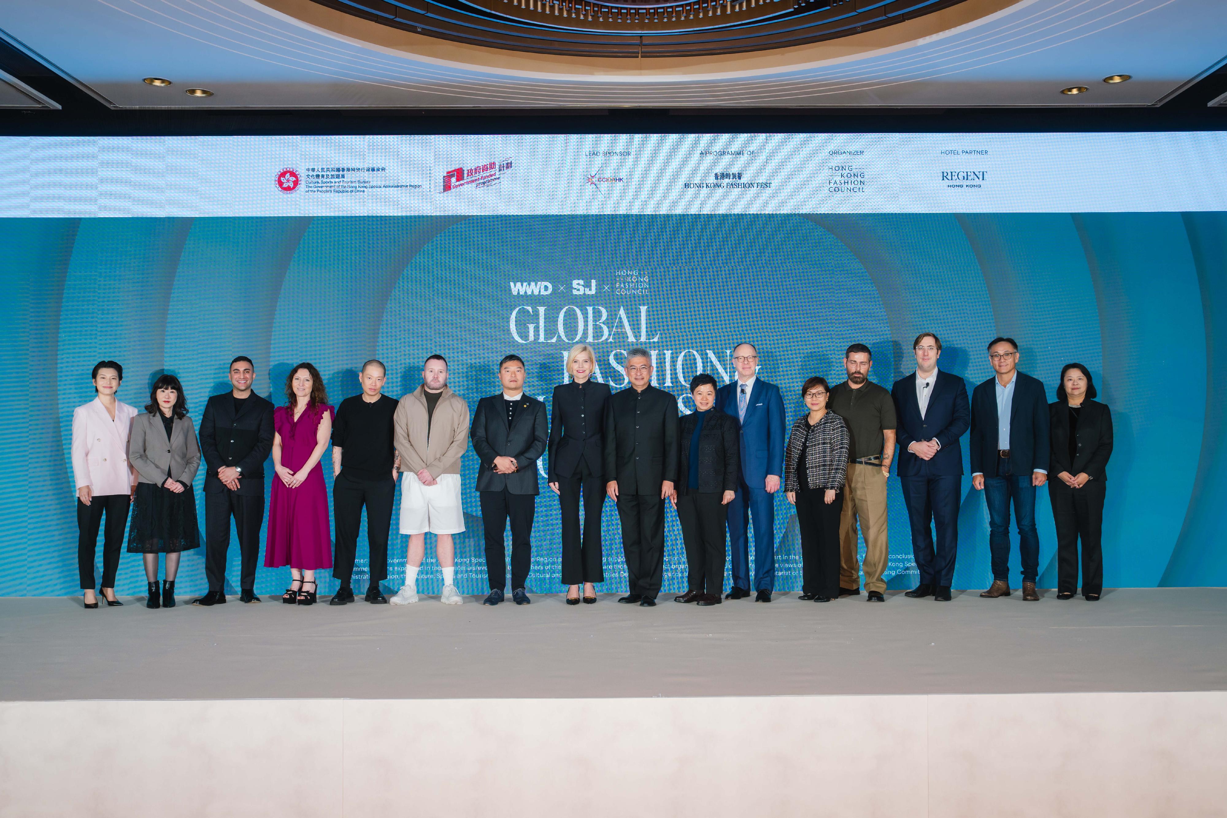 Jointly organised by the Hong Kong Fashion Council, Women's Wear Daily (WWD), and Sourcing Journal (SJ), the WWD x SJ Global Fashion & Business Conference and the WWD Fashion Loves Culture Gala were held today (November 26) at Regent Hong Kong as one of the flagship programmes of the second edition of Hong Kong Fashion Fest spearheaded and funded by the Government. Photo shows the Under Secretary for Culture, Sports and Tourism, Mr Raistlin Lau (eighth right); the Chief Executive Officer of the Fairchild Media Group, Ms Amanda Smith (eighth left); representative of the Hong Kong Fashion Council, Mr Bosco Law (seventh left); the Commissioner for Cultural and Creative Industries, Miss Drew Lai (seventh right), and fashion and design industries from all over the world at the WWD x SJ Global Fashion & Business Conference.